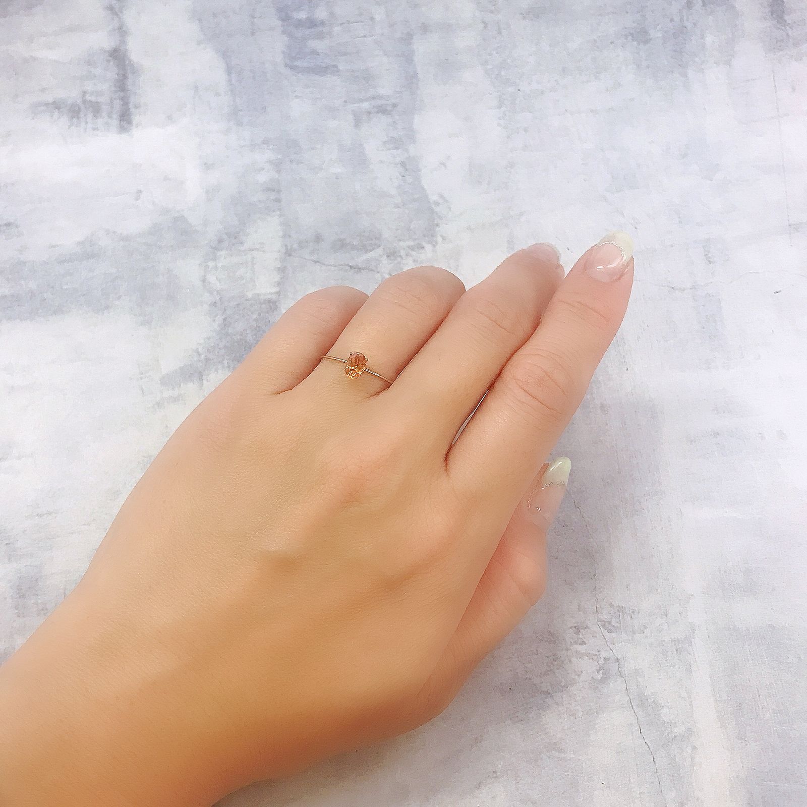 スペサルティンガーネット(宝石名ガーネット)タンザニア産 0.62ct 識別済[220817544]5.9x4mm前後