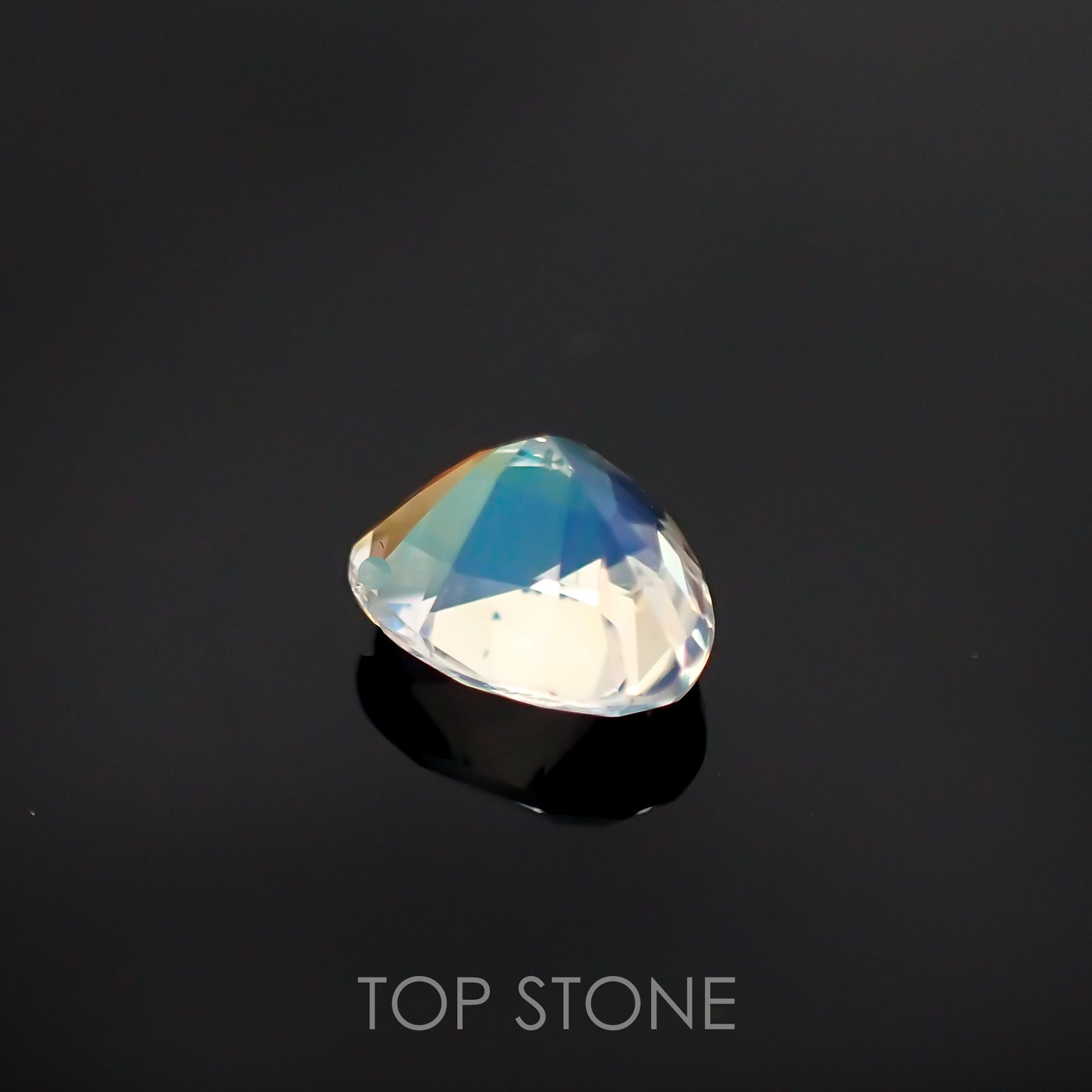 レインボームーンストーン(アンデシンラブラドライト) マダガスカル産 ルース 0.94ct[210611270]6.1×7mm前後