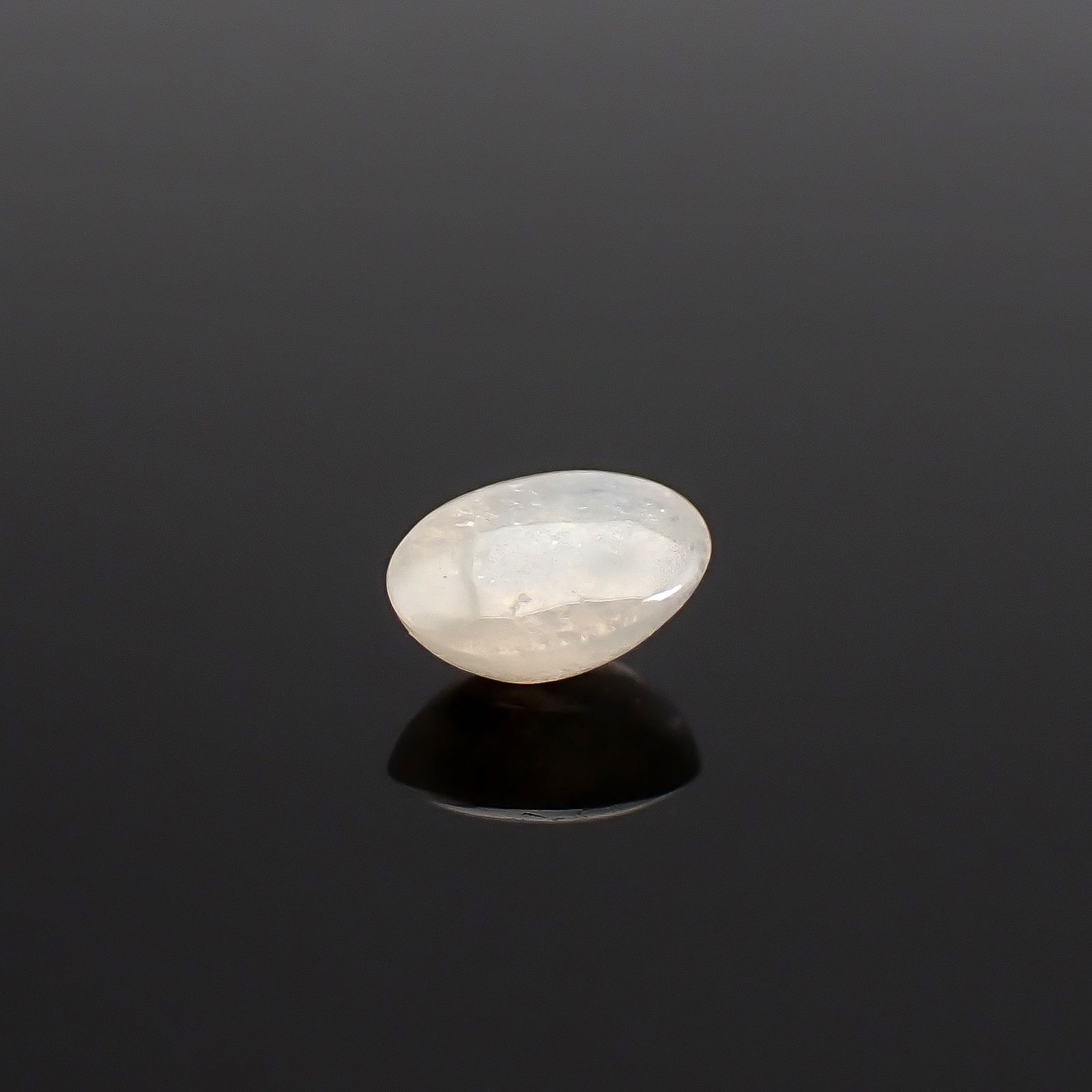 ジルコンキャッツアイ ビルマ産 0.73ct / 5.6x4.3mm前後 [260832885]