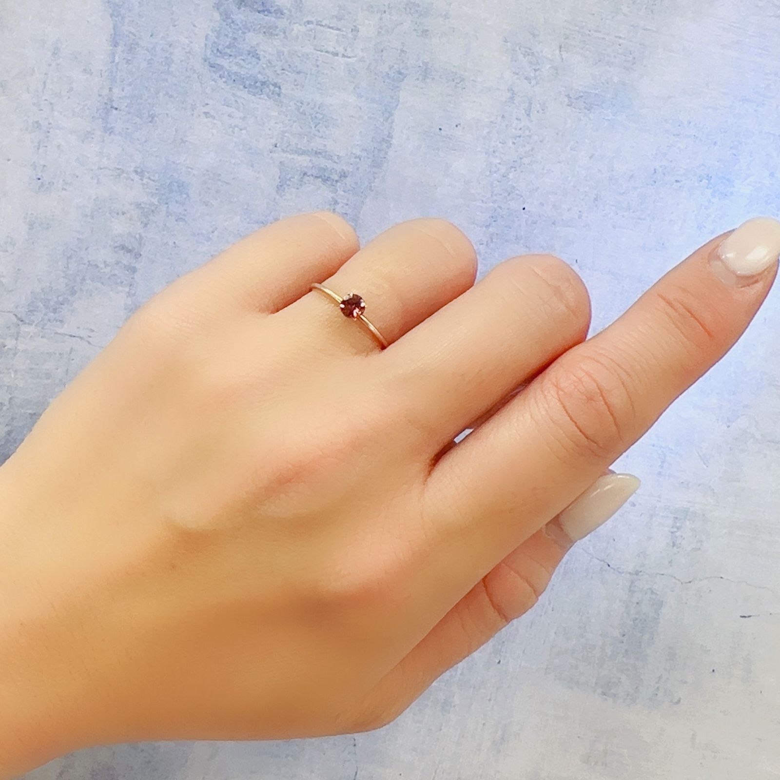カラーシフトマラヤガーネット タンザニア産 0.31ct[230120279]4x4mm前後