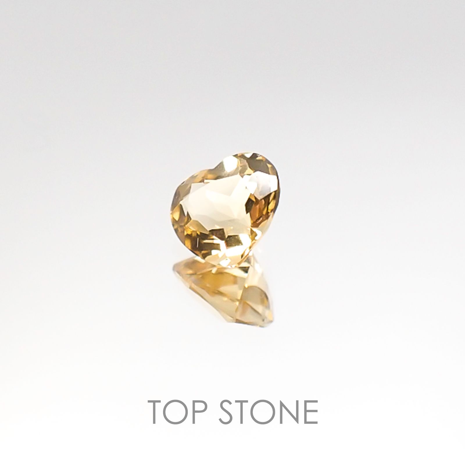 インペリアルトパーズ ブラジル産 ルース 0.5ct[20106514]5.2×4.9mm前後