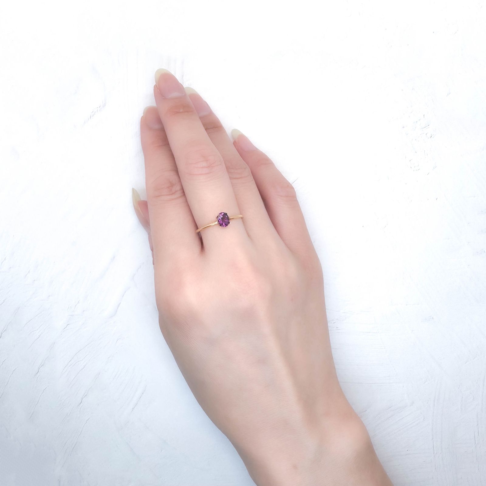 グレープガーネット(宝石名ガーネット)ブラジル産 識別済 0.55ct / 5.3x4.2mm前後 [250931145]