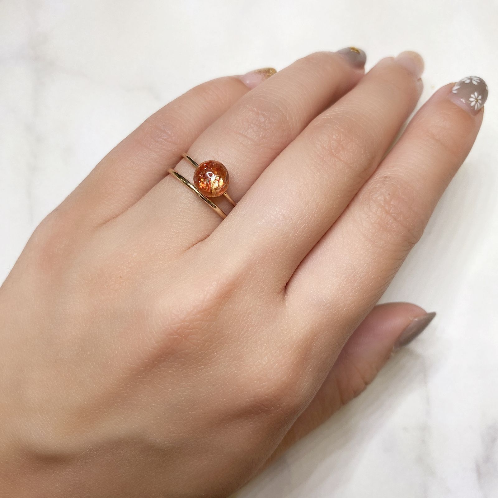 イリュージョンサンストーン タンザニア産 ルース 1.22ct[210812310]7×7mm前後