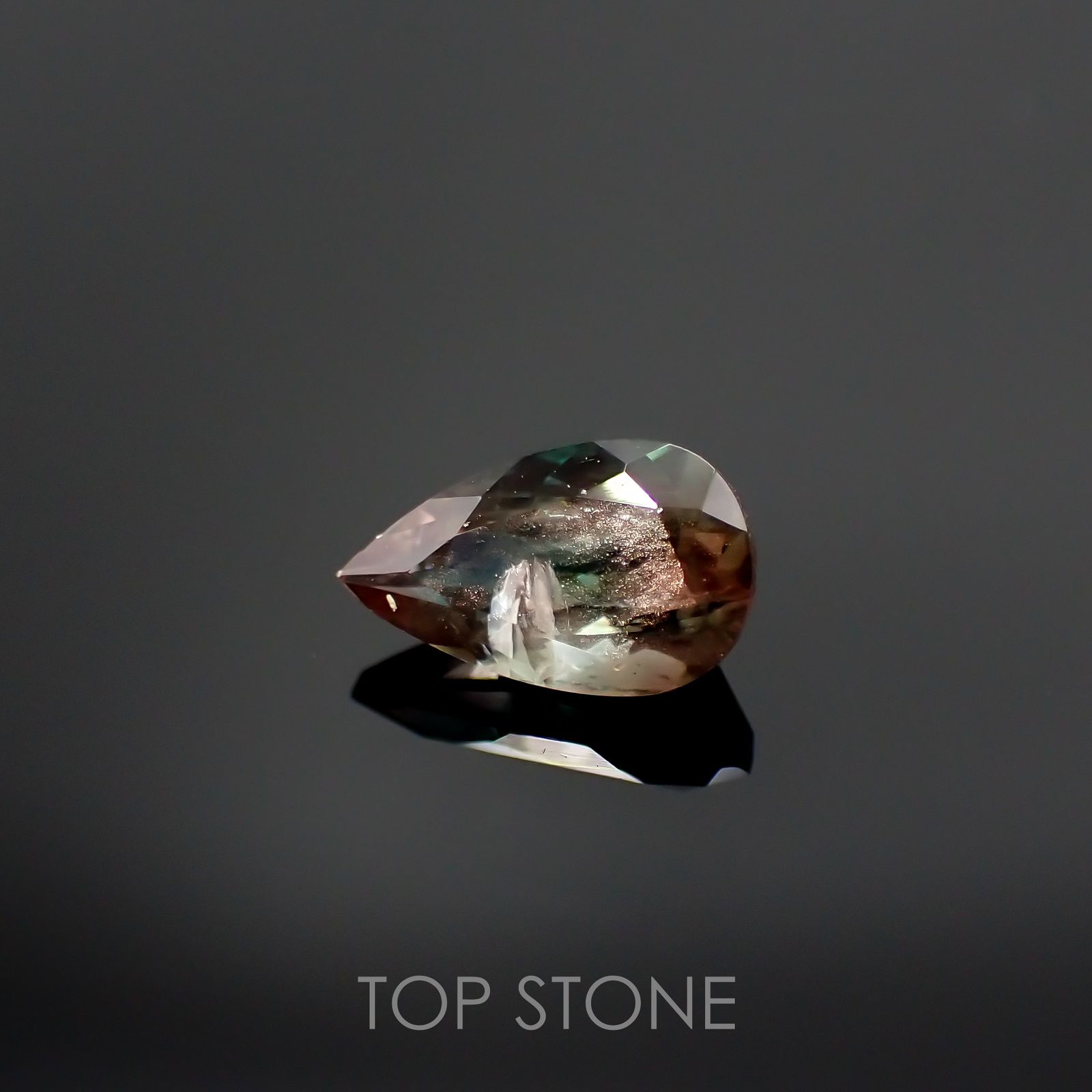 バイカラーオレゴンサンストーン アメリカ産 ルース 0.7ct[210711954]7.8×4.7mm前後