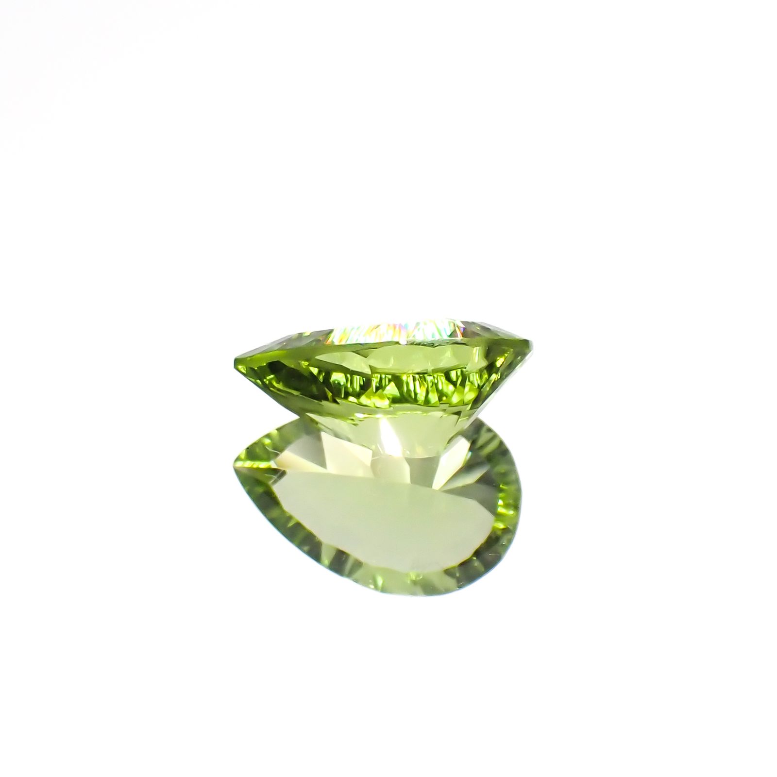 ◇コンケーブカット◇ペリドット 中国産 1.69ct[230622297]9.9x6.8mm前後