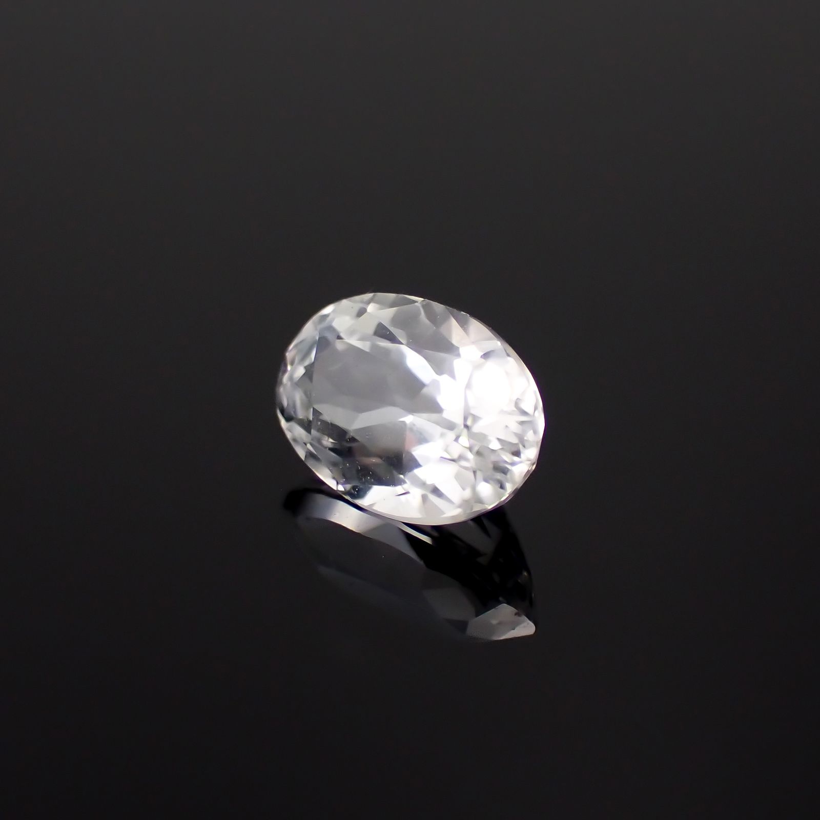 フェナカイト(宝石名フェナカイト)ブラジル産 0.68ct 識別済[230923401]6.7x4.5mm前後