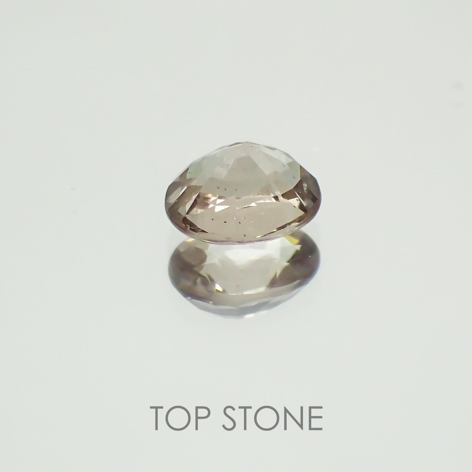 カラーチェンジマラヤガーネット(宝石名ガーネット) タンザニア産 0.57ct 識別済[21029646]5.3×4.5mm前後