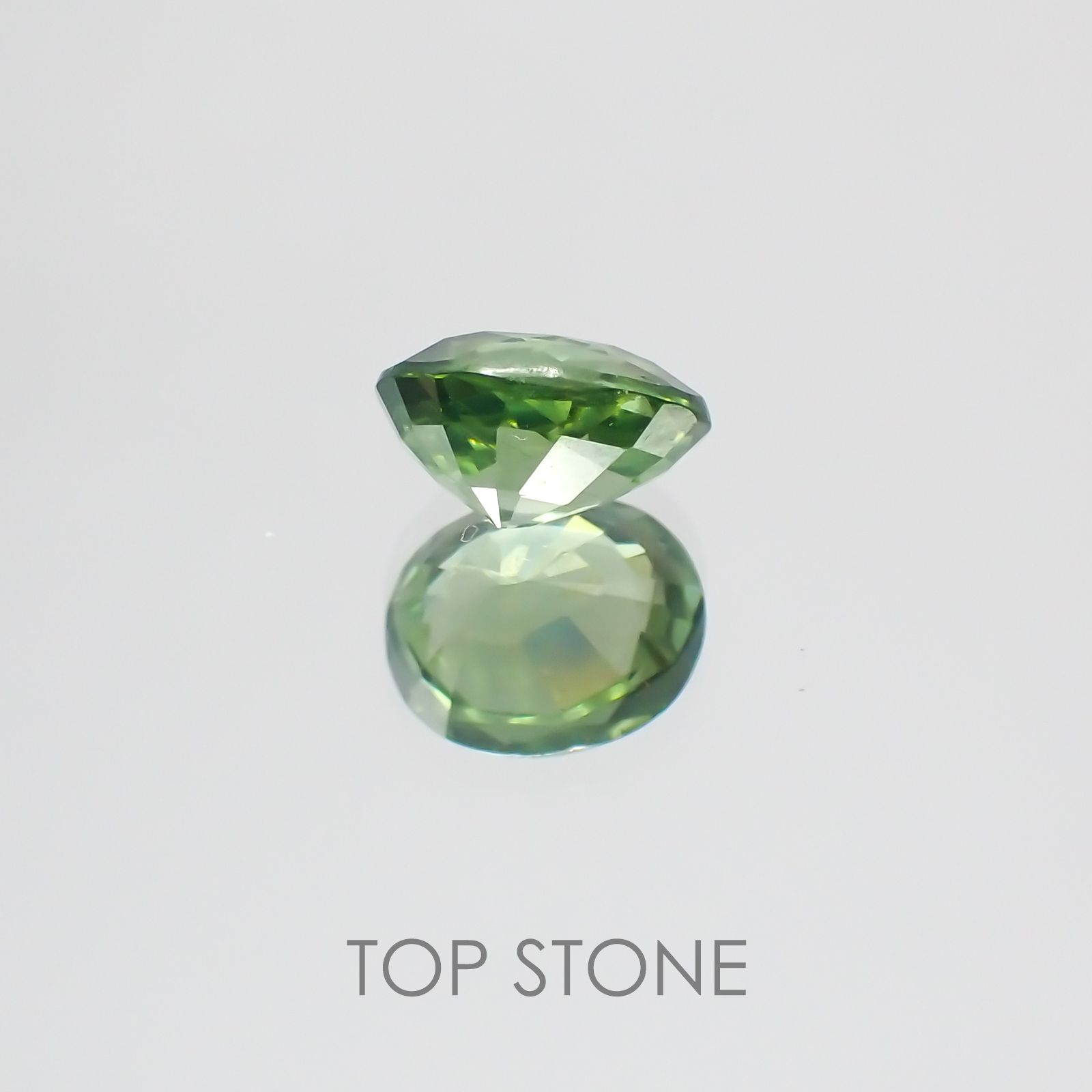 グリーンジルコン(宝石名ジルコン) スリランカ・カンボジア産 1.39ct 識別済[21038612]7.1×5.9mm前後