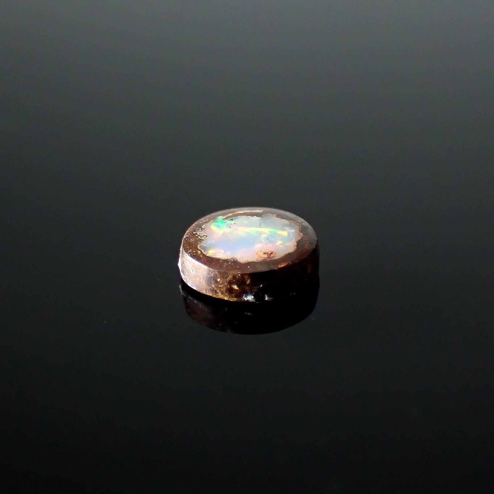 ウッドオパール オーストラリア産 0.39ct / 5.5x5mm前後 [251031196]