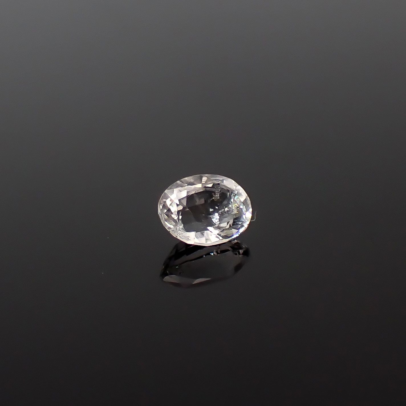 テネブレッセンススキャポライト アフガニスタン産 0.25ct / 4.7x3.6mm前後 [260432044]