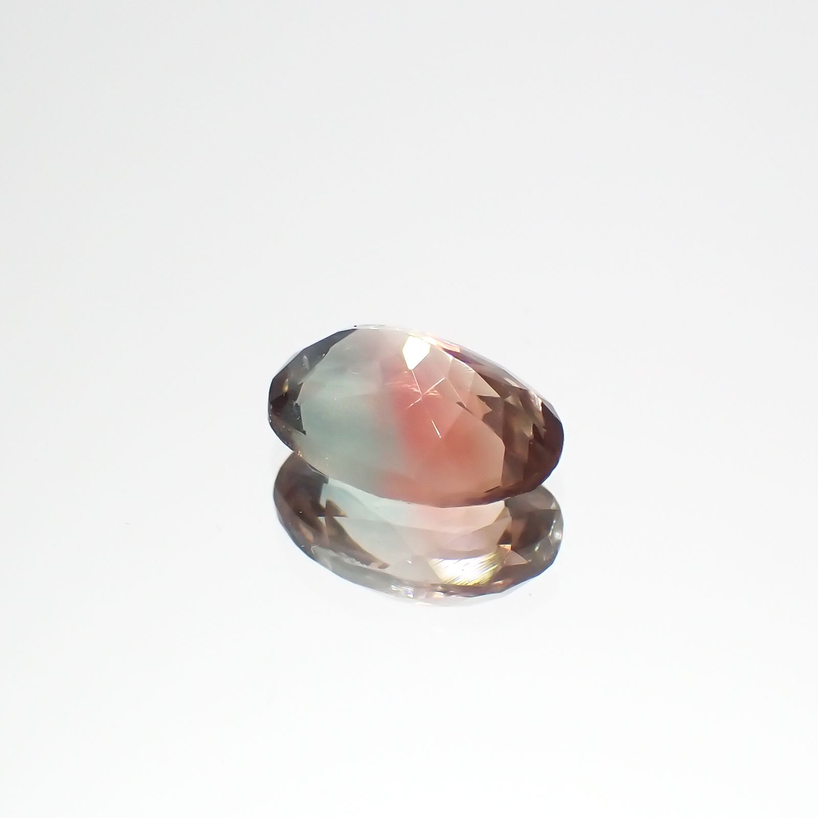 パーティカラーオレゴンサンストーン アメリカ・オレゴン州産 0.93ct[230722847]7.8x5.7mm前後
