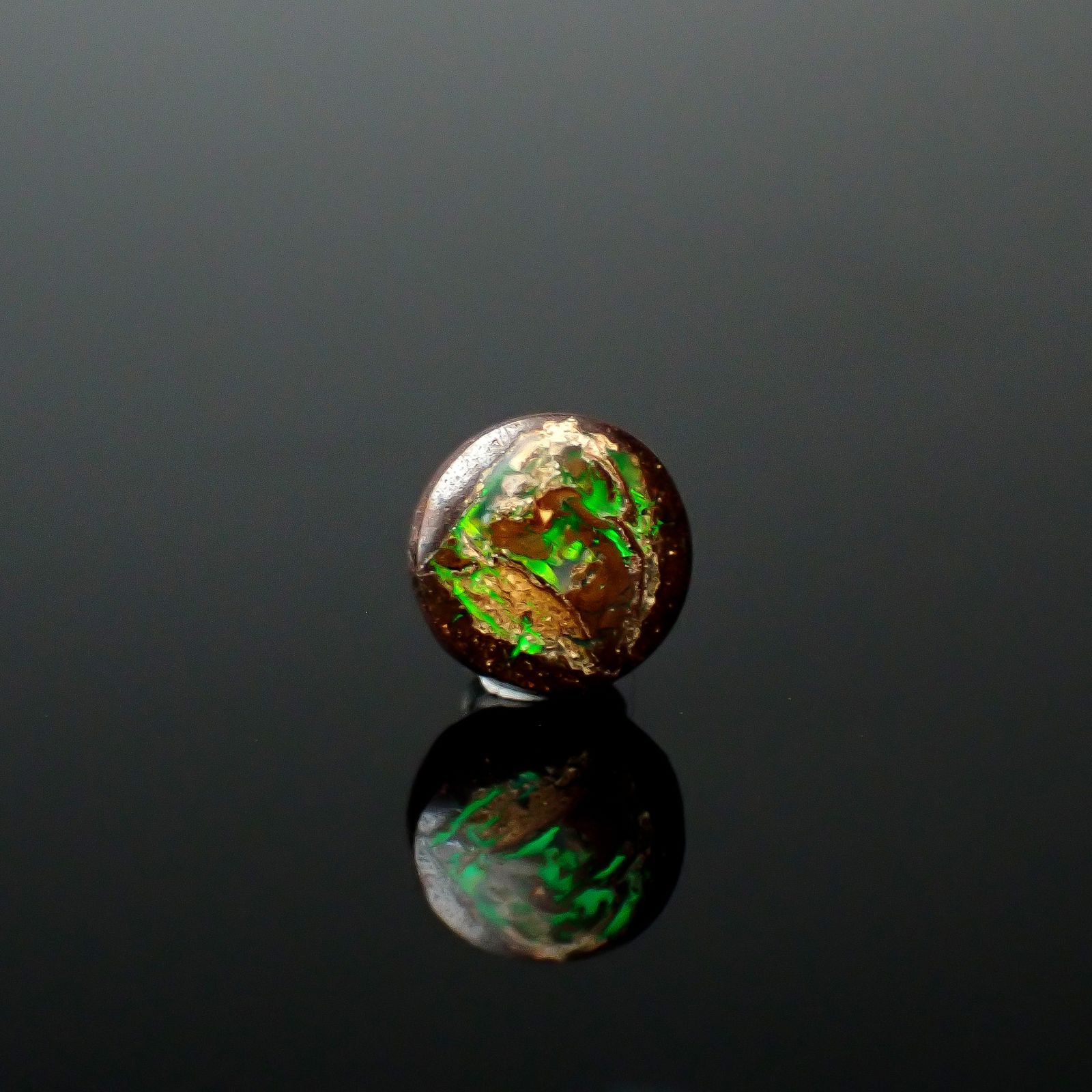 ウッドオパール オーストラリア産 0.48ct / 5.6x5.5mm前後 [251131293]