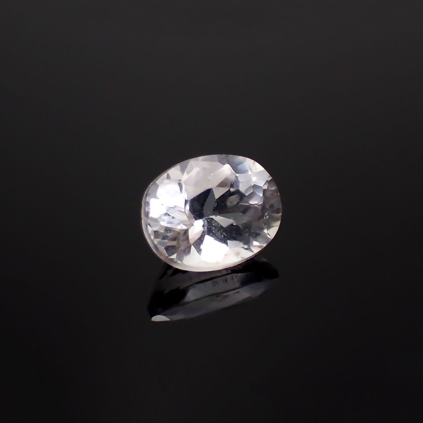 テネブレッセンススキャポライト アフガニスタン産 0.60ct / 6.1x4.8mm前後 [251218567]