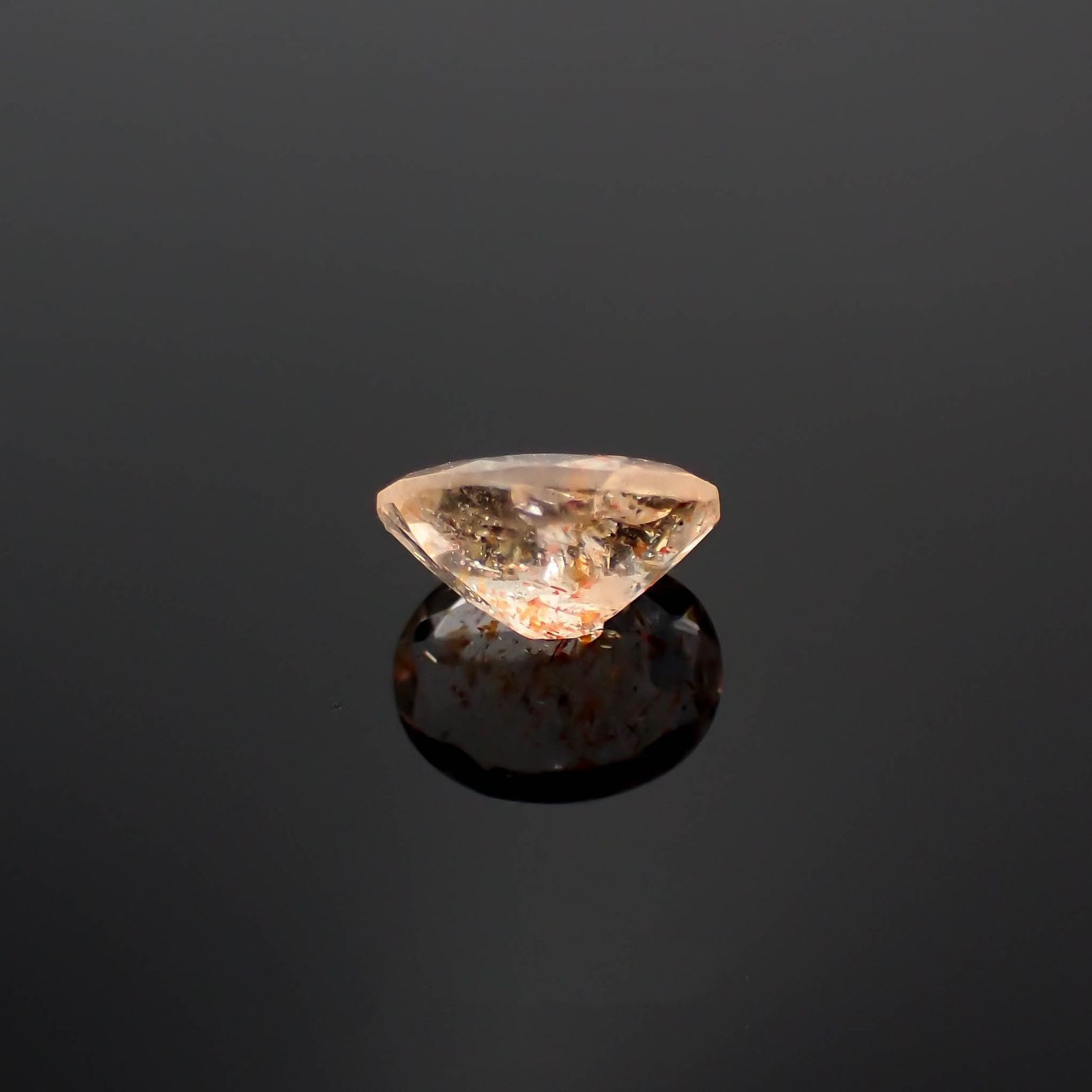イリュージョンサンストーン タンザニア産 1.59ct / 9x7.1mm前後 [230120119]