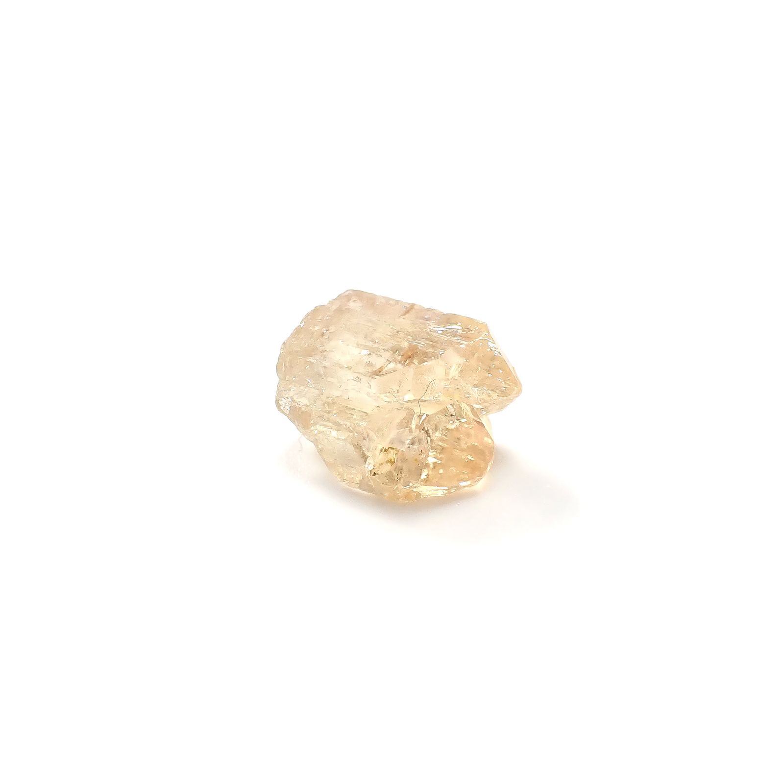 インペリアルトパーズ 原石 ザンビア産 8.26ct / 12.3x10.8mm前後 [250730938]