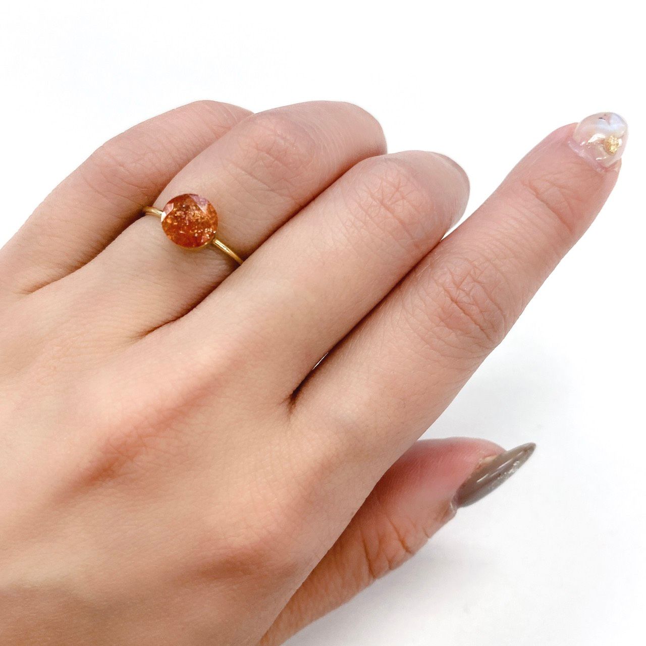 イリュージョンサンストーン(宝石名フェルドスパー) タンザニア産 1.33ct 識別済[210610869]7.1×7mm前後
