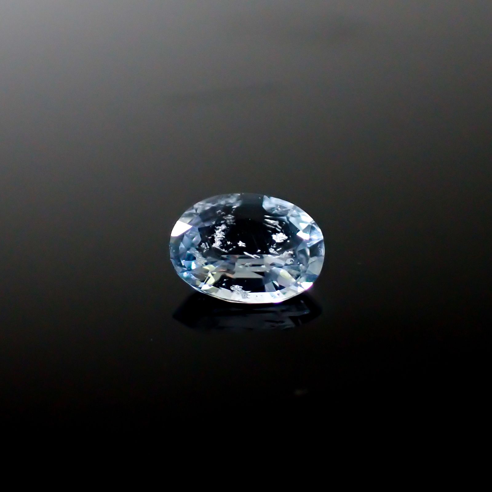 テネブレッセンススキャポライト アフガニスタン産 0.33ct / 5.7x4.2mm前後 [260532261]