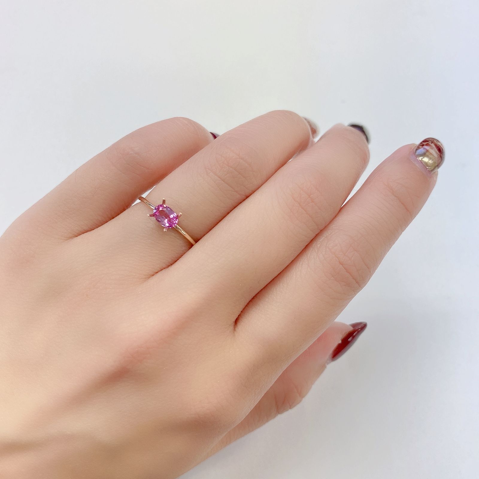 パパラチャサファイア(宝石名サファイア/別名パパラチャ・サファイア) スリランカ産 0.500ct DGL鑑付[21029433]5.8×3.9mm前後