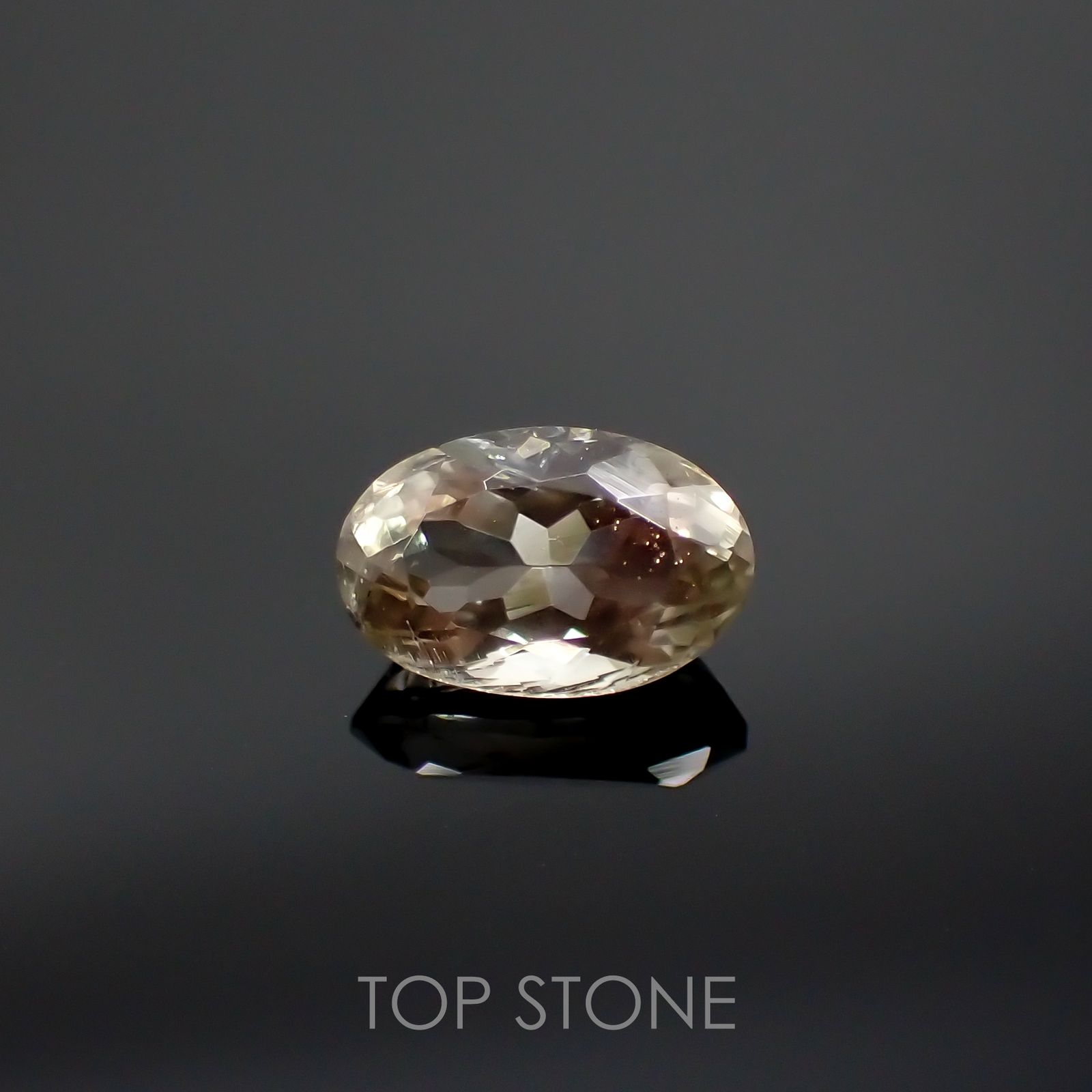 バイカラーオレゴンサンストーン(宝石名バイカラー・ラブラドライト) アメリカ・オレゴン州産 1.090ct ソ付(彩珠)[210711951]8.1×5.3mm前後