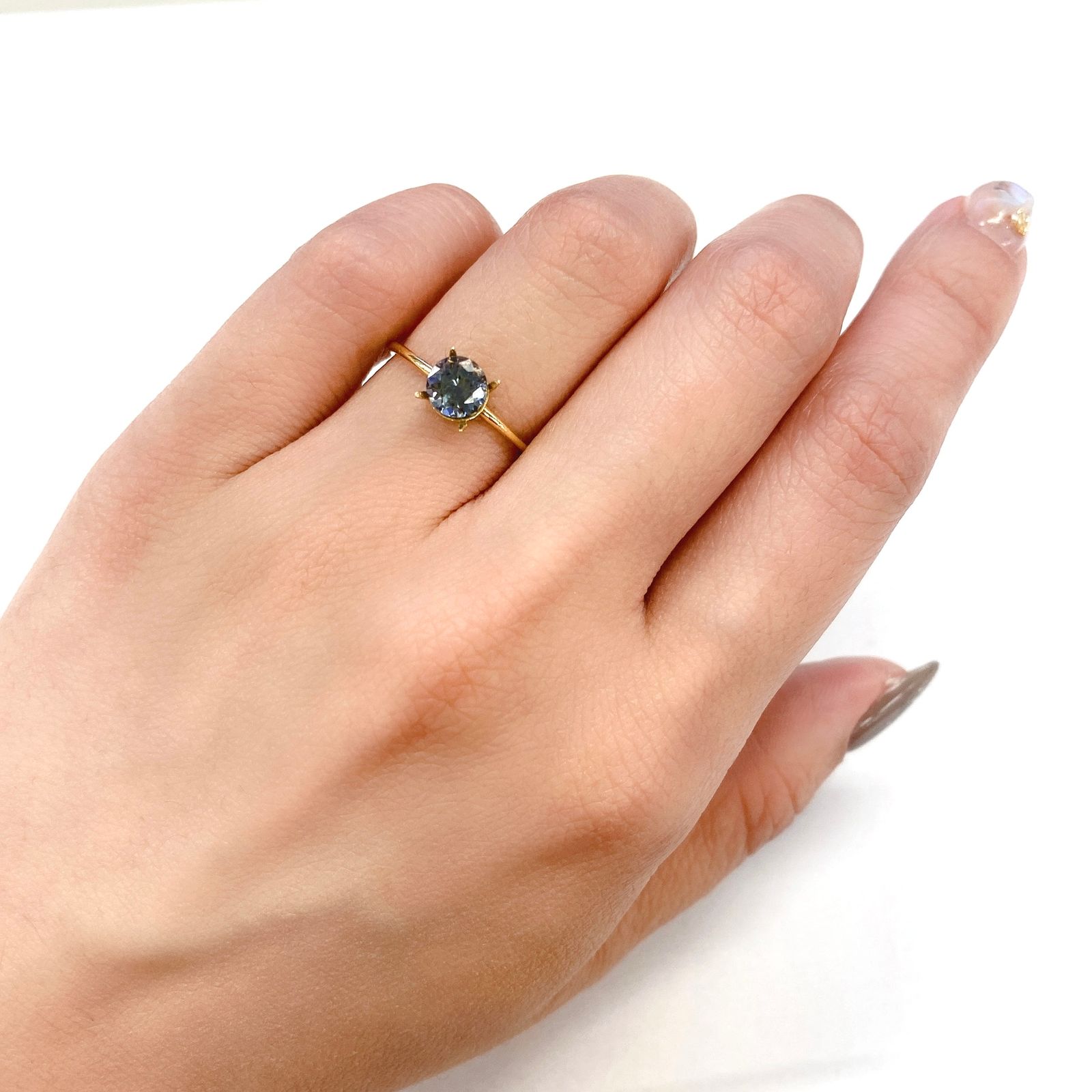 バイカラータンザナイト(ゾイサイト) タンザニア産 ルース 0.79ct[210410576]5.7×5.6mm前後