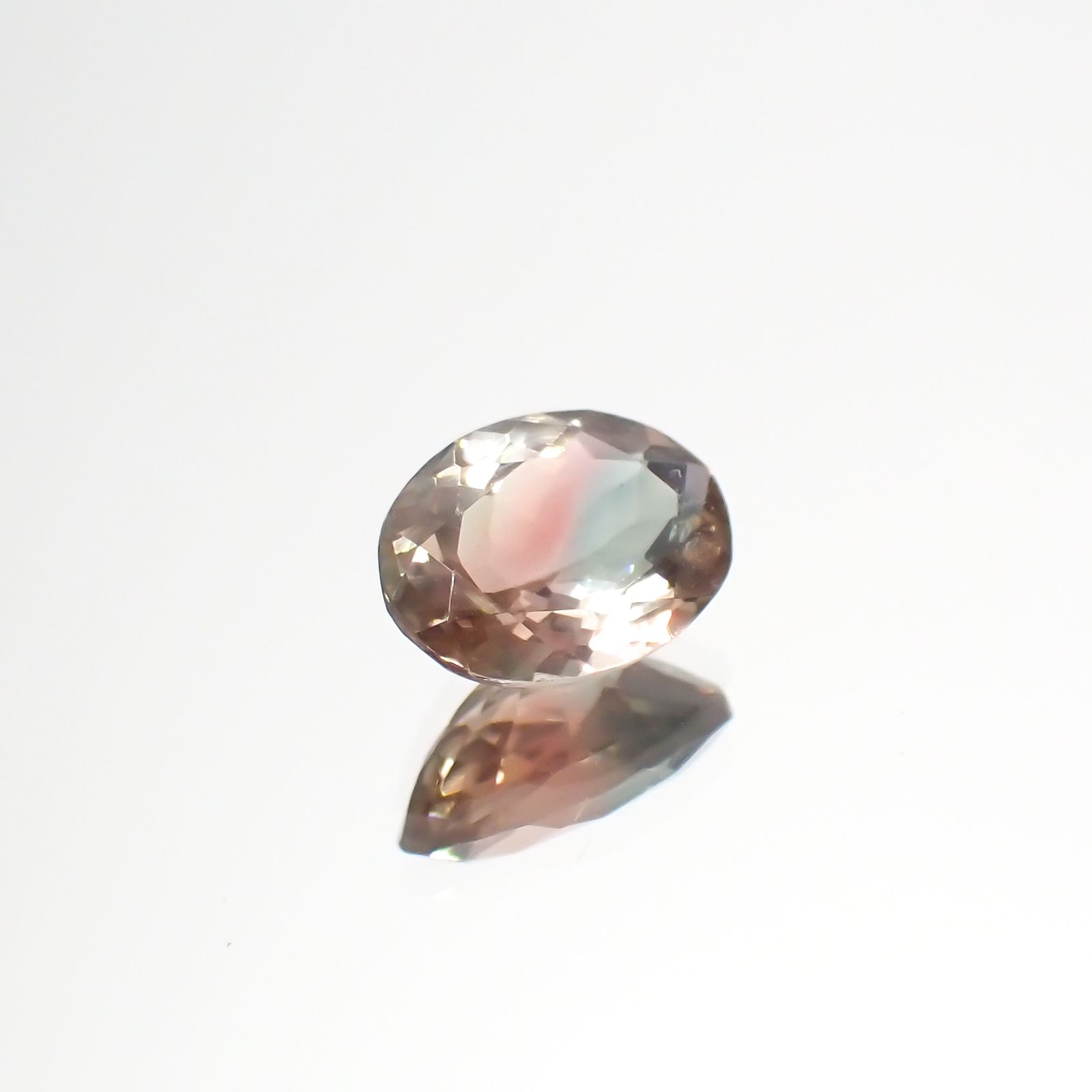 パーティカラーオレゴンサンストーン アメリカ・オレゴン州産 0.93ct[230722847]7.8x5.7mm前後