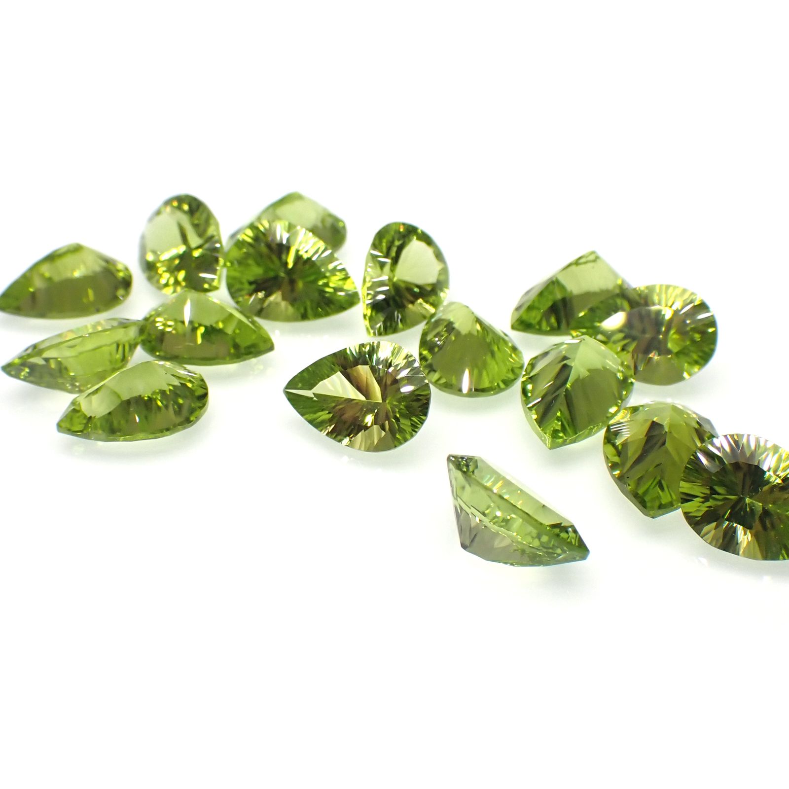 <ランダムセレクト1個販売>◇コンケーブカット◇ペリドット 中国産 約1.70-2.10ct[230722581]10x7mm前後