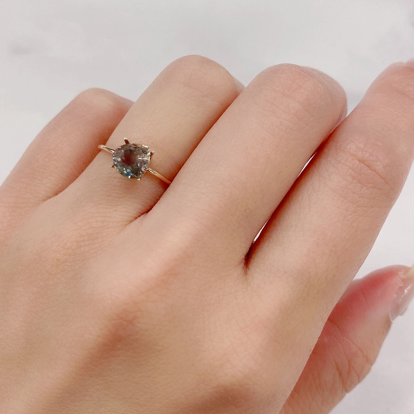 バイカラーオレゴンサンストーン(宝石名バイカラー・ラブラドライト) アメリカ・オレゴン州産 1.099ct ソ付(彩珠)[210711953]6.9×6.8mm前後