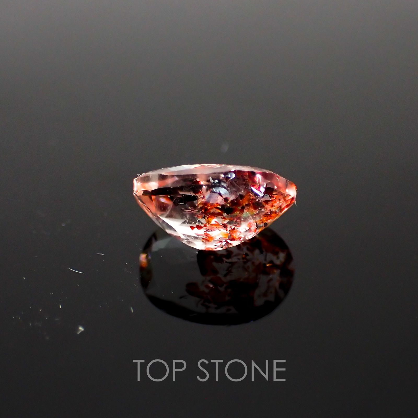ファイヤークォーツ ナイジェリア産 ルース 1.41ct[210410202]8.7×6.3mm前後