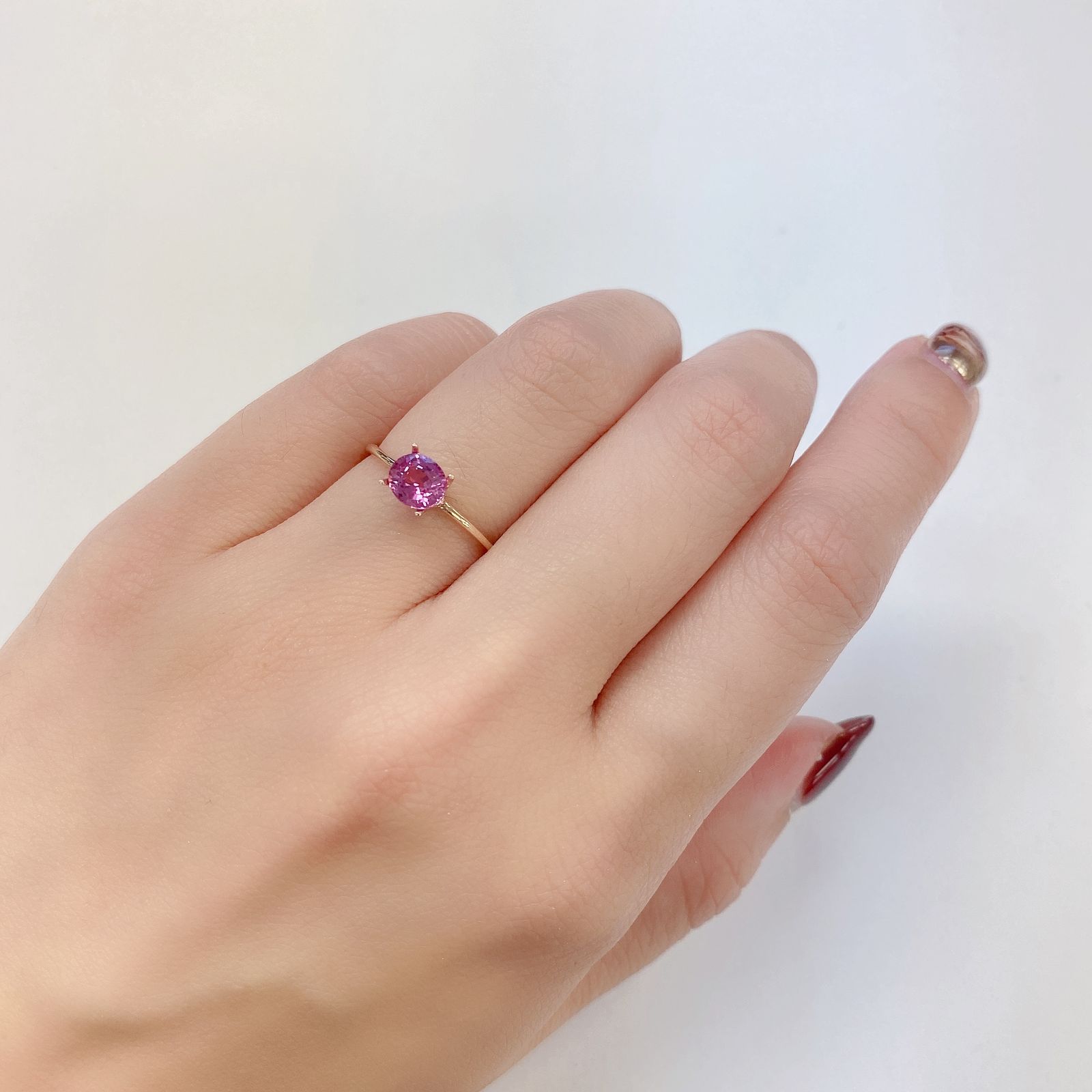 パパラチャサファイア(宝石名サファイア/別名パパラチャ・サファイア) スリランカ産 0.856ct DGL鑑付[21029431]5.9×5mm前後