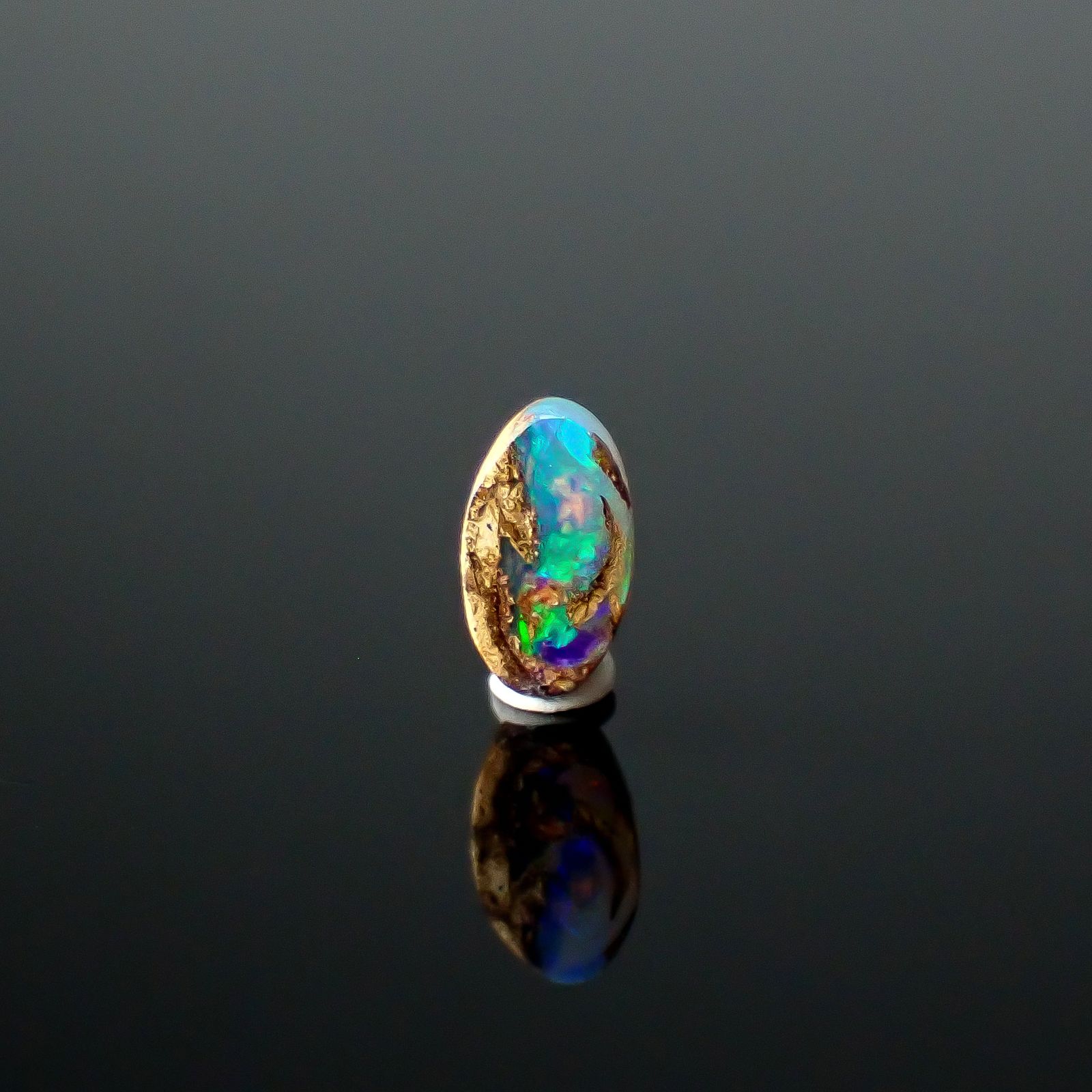 ウッドオパール オーストラリア産 0.28ct / 6.1x3.5mm前後 [251031201]