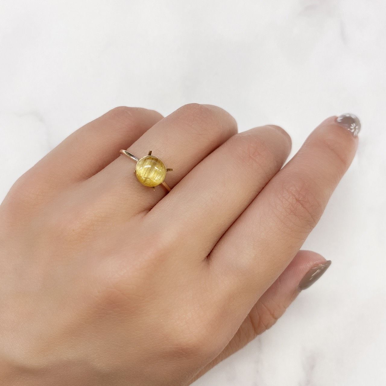 ルチルクォーツ(宝石名ルチルレイテッド・クォーツ) ブラジル産 1.98ct 識別済[210913301]7.6×7.5mm前後