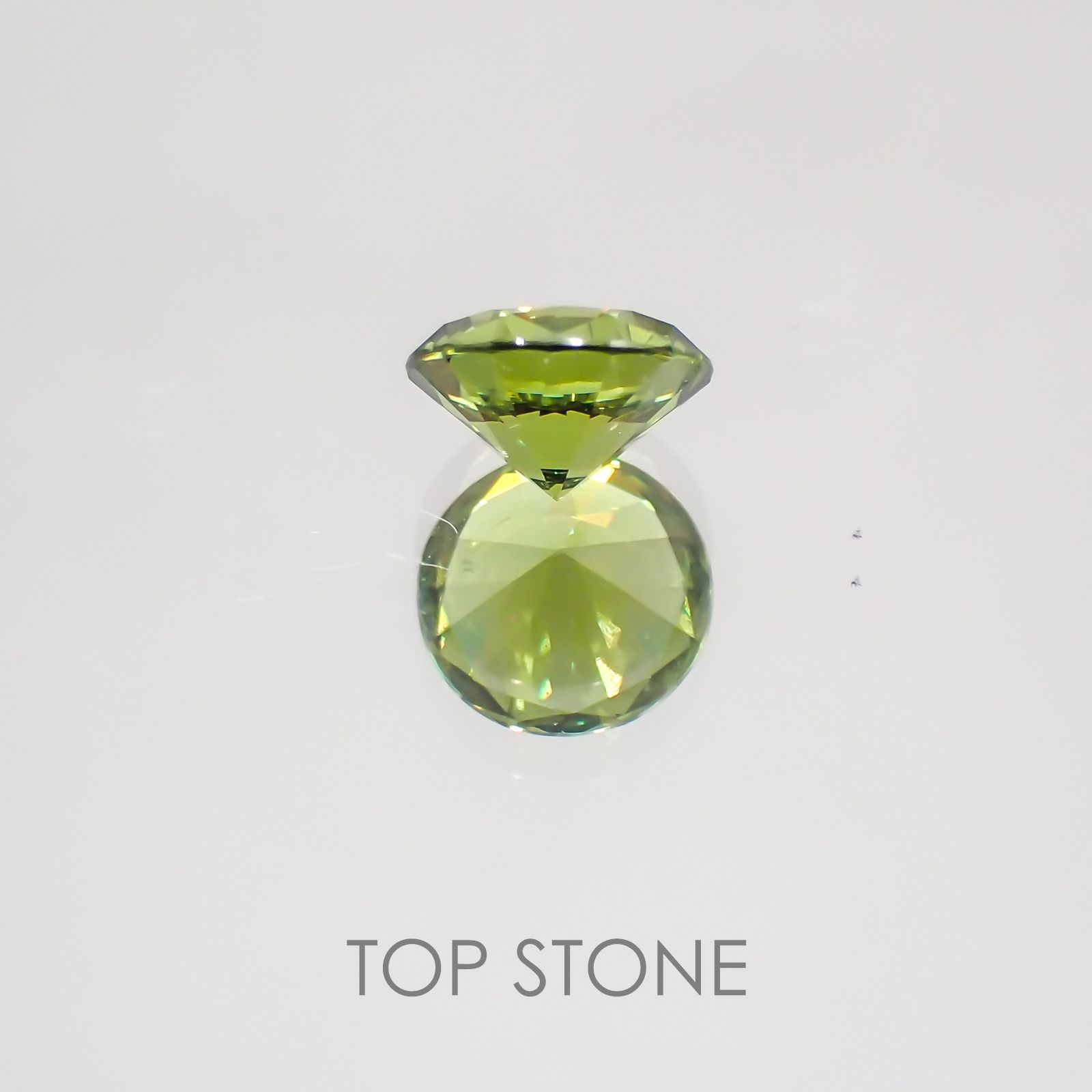 デマントイドガーネット(宝石名デマントイド・ガーネット)ロシア産 0.581ct ソ付(彩珠)[220717103]5.2x5.1mm前後
