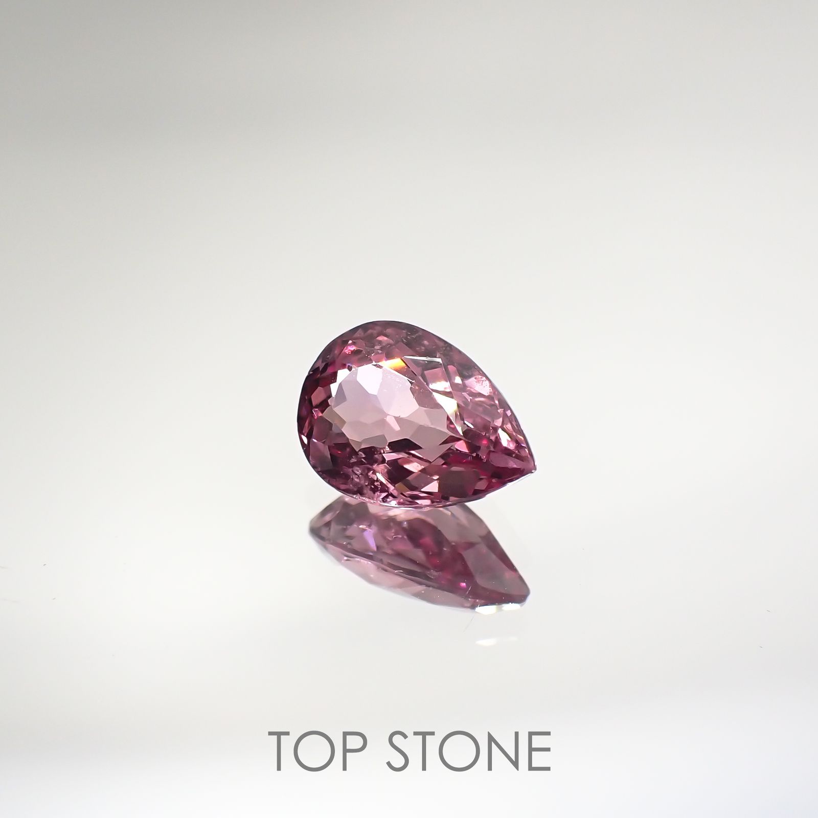 マラヤガーネット(宝石名アルマンディン スペサルティン パイロープ・ガーネット) タンザニア産 2.333ct ソ付(彩珠)[210711880]9.6×6.8mm前後