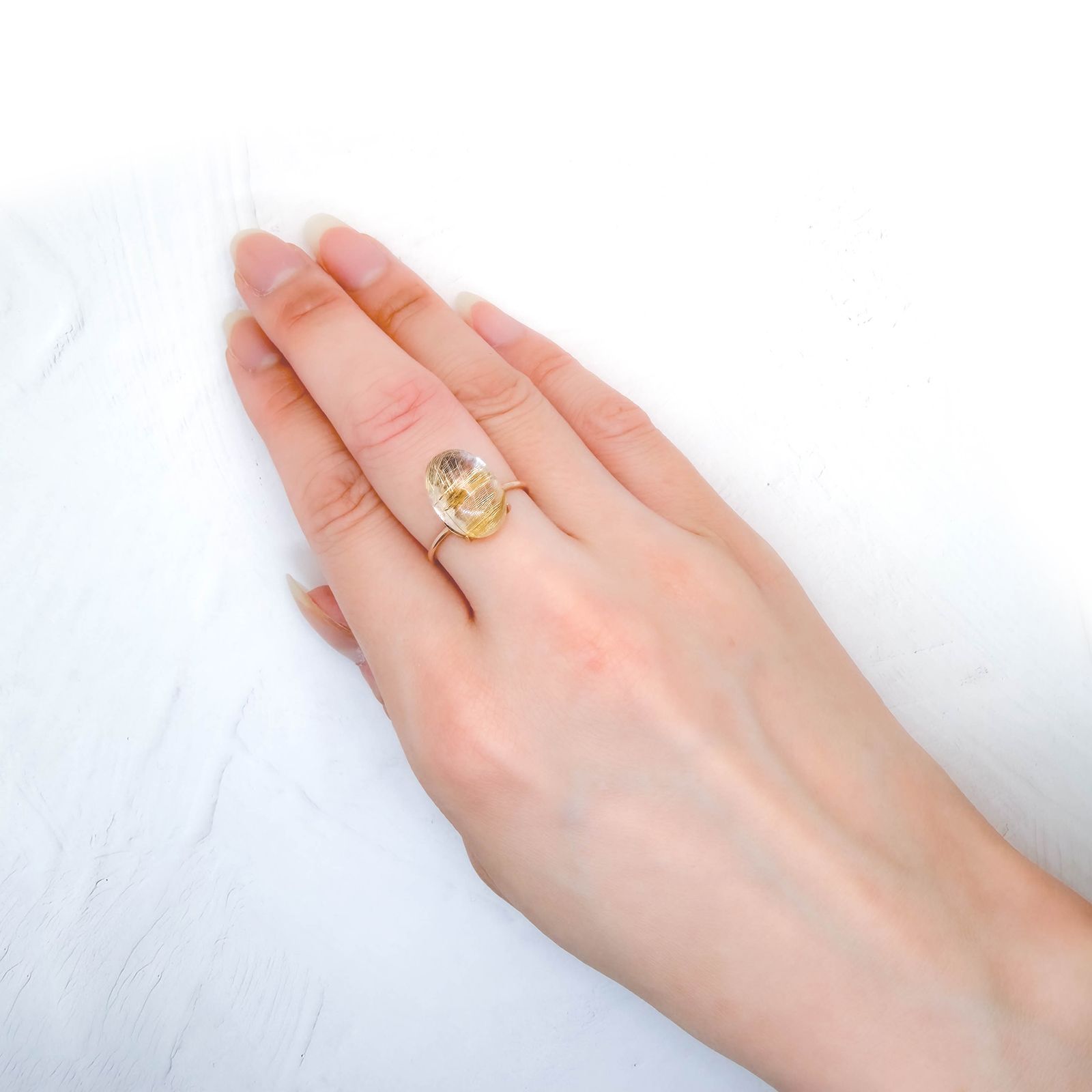 ◇バフトップカット◇ルチルクォーツ ブラジル産 7.40ct / 13.9x9.9mm前後 [260732401]