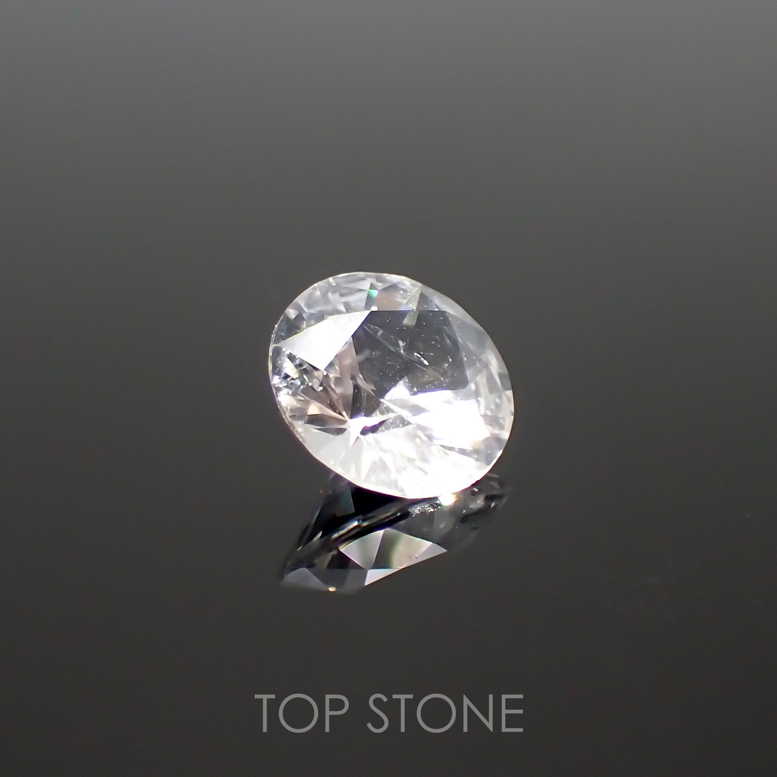 フェナカイト(宝石名フェナカイト)ブラジル産 0.99ct 識別済[220115160]6.9x6.9mm前後