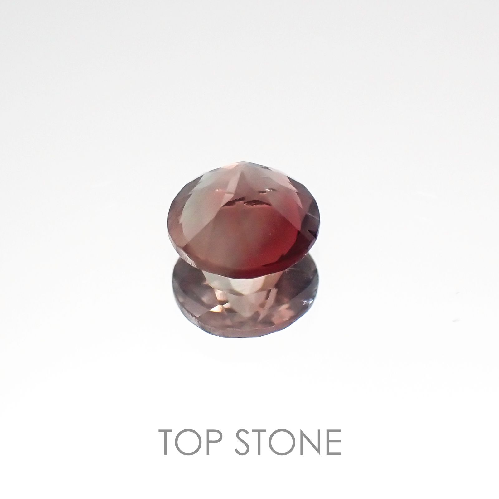 バイカラーオレゴンサンストーン アメリカ産 ルース 0.42ct[20107097]5.1×5mm前後