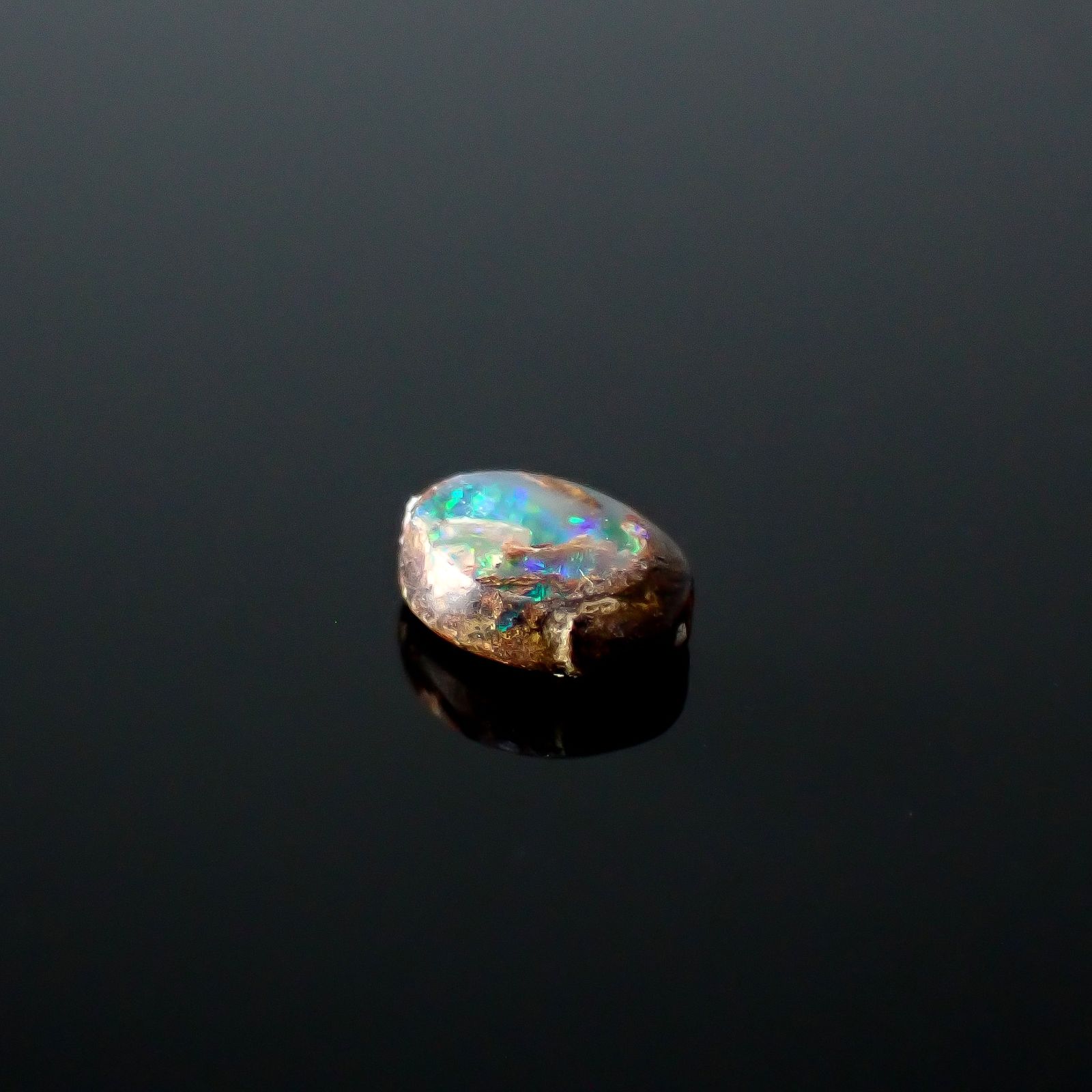 ウッドオパール オーストラリア産 0.21ct / 5x3.6mm前後 [251031198]