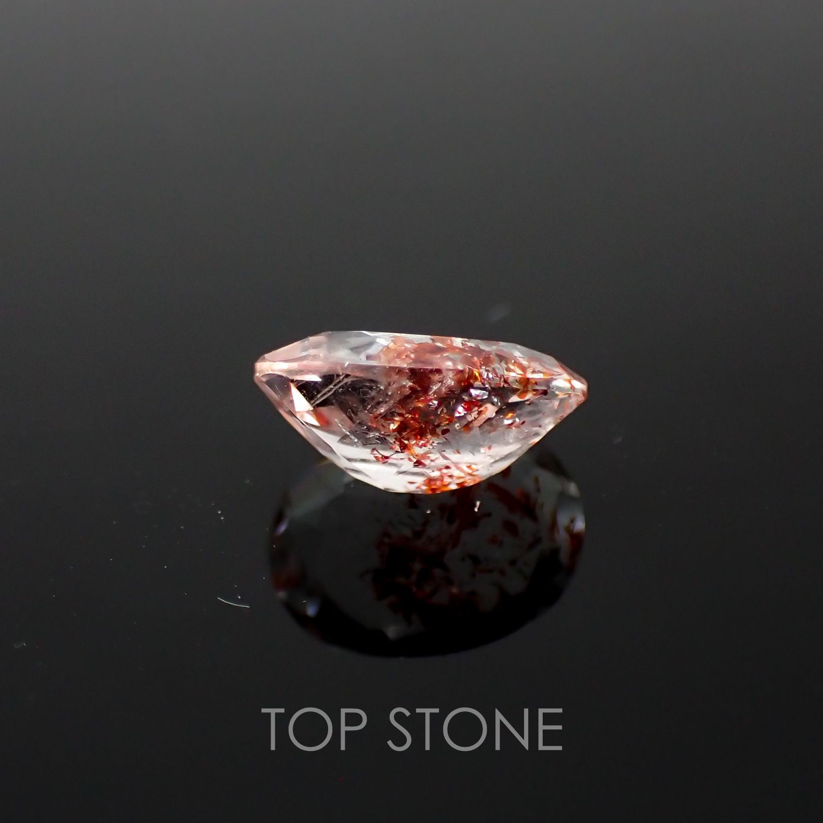 ファイヤークォーツ ナイジェリア産 ルース 1.46ct[210410209]8.9×6.9mm前後