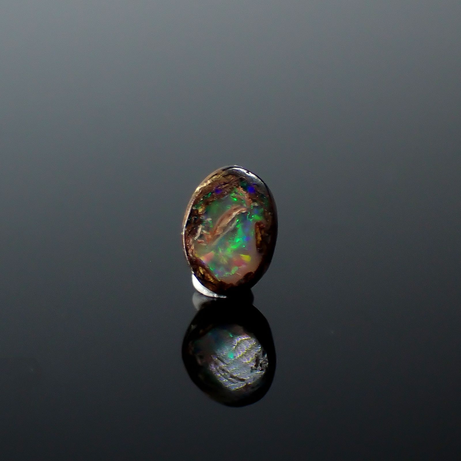 ウッドオパール オーストラリア産 0.21ct / 5x3.6mm前後 [251031198]