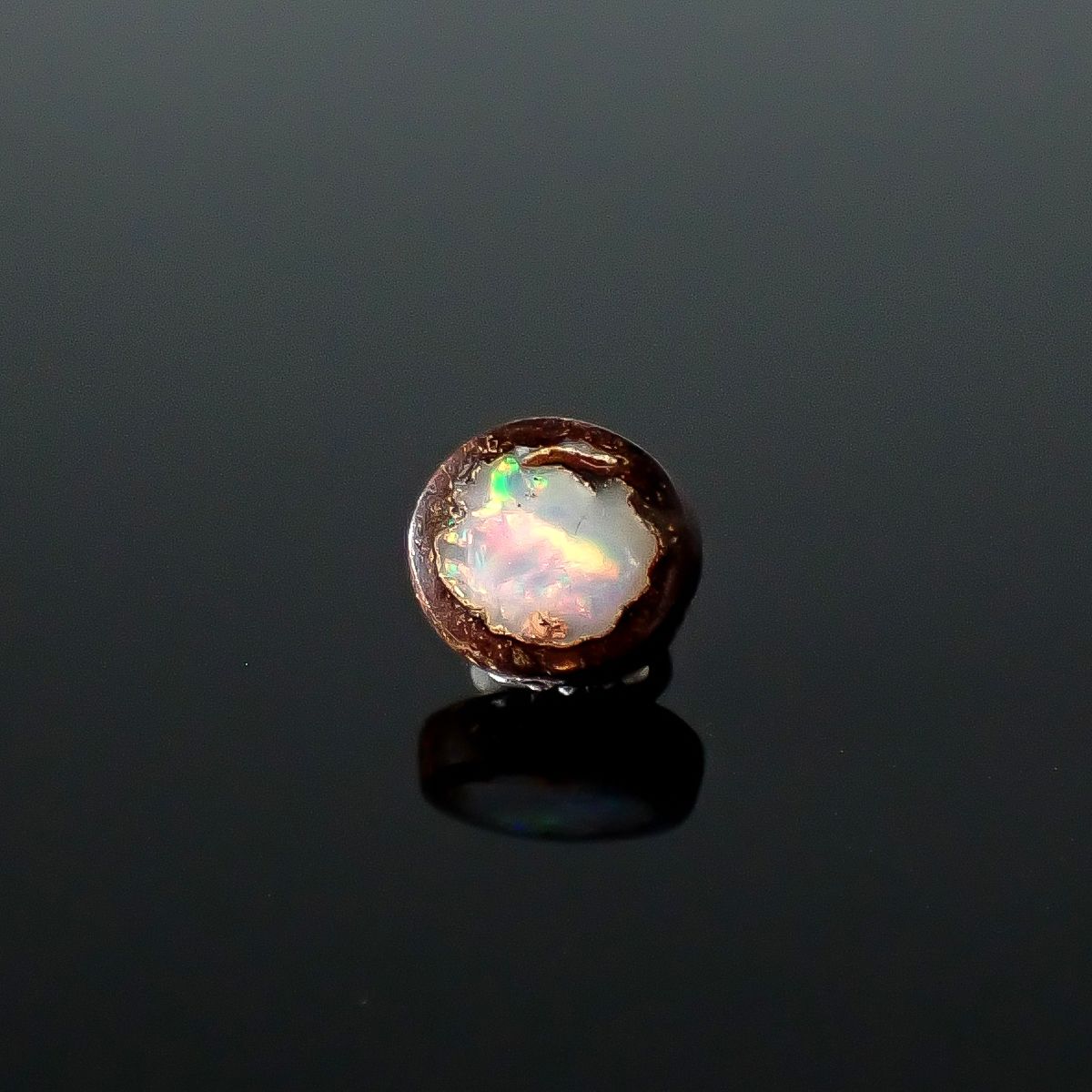ウッドオパール オーストラリア産 0.39ct / 5.5x5mm前後 [251031196]