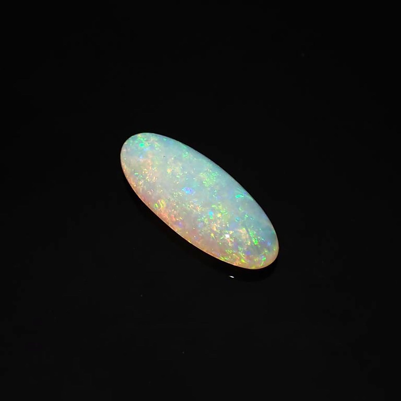 クリスタルオパール(宝石名オパール)オーストラリア産 ソ付(彩珠) 4.892ct / 21.5x8.8mm前後 [220717009]