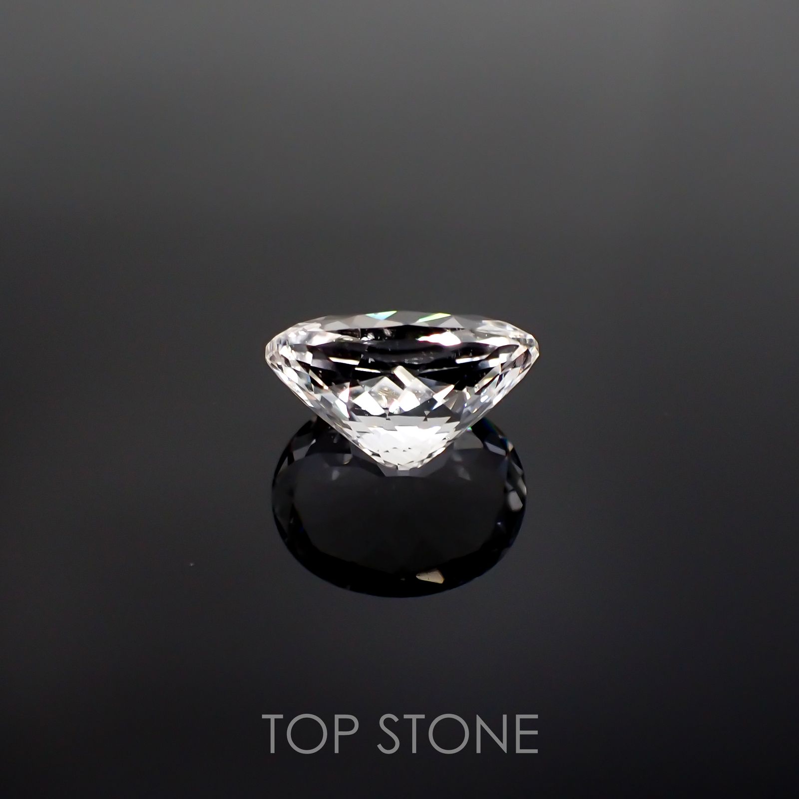 フェナカイト(宝石名ホワイト・フェナカイト) ブラジル産 23.035ct ソ付(彩珠)[210812709]20.6×16.8mm前後