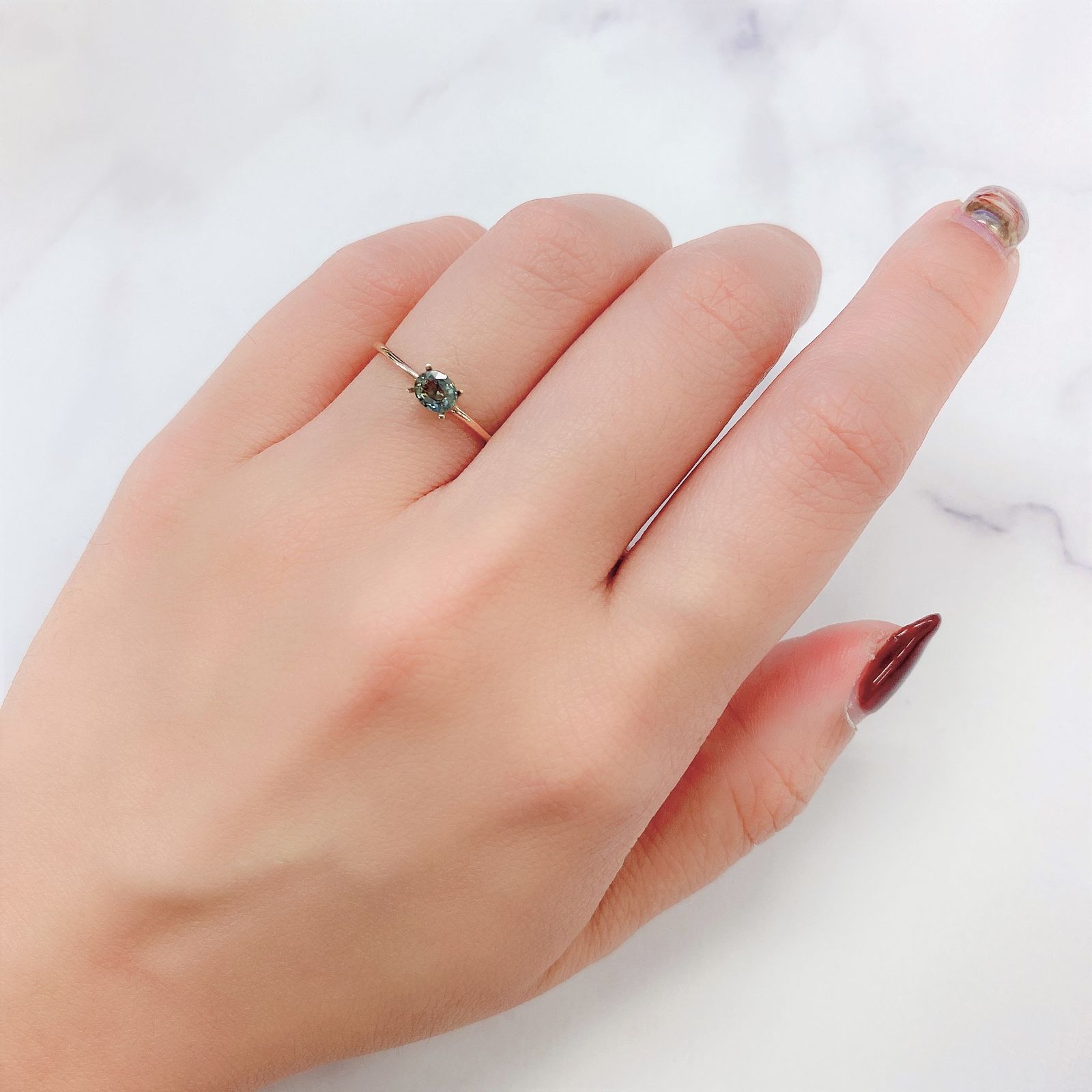 アレキサンドライト(宝石名アレキサンドライト) マダガスカル産 0.342ct ソ付(彩珠)[20117000]4.5×3.7mm前後