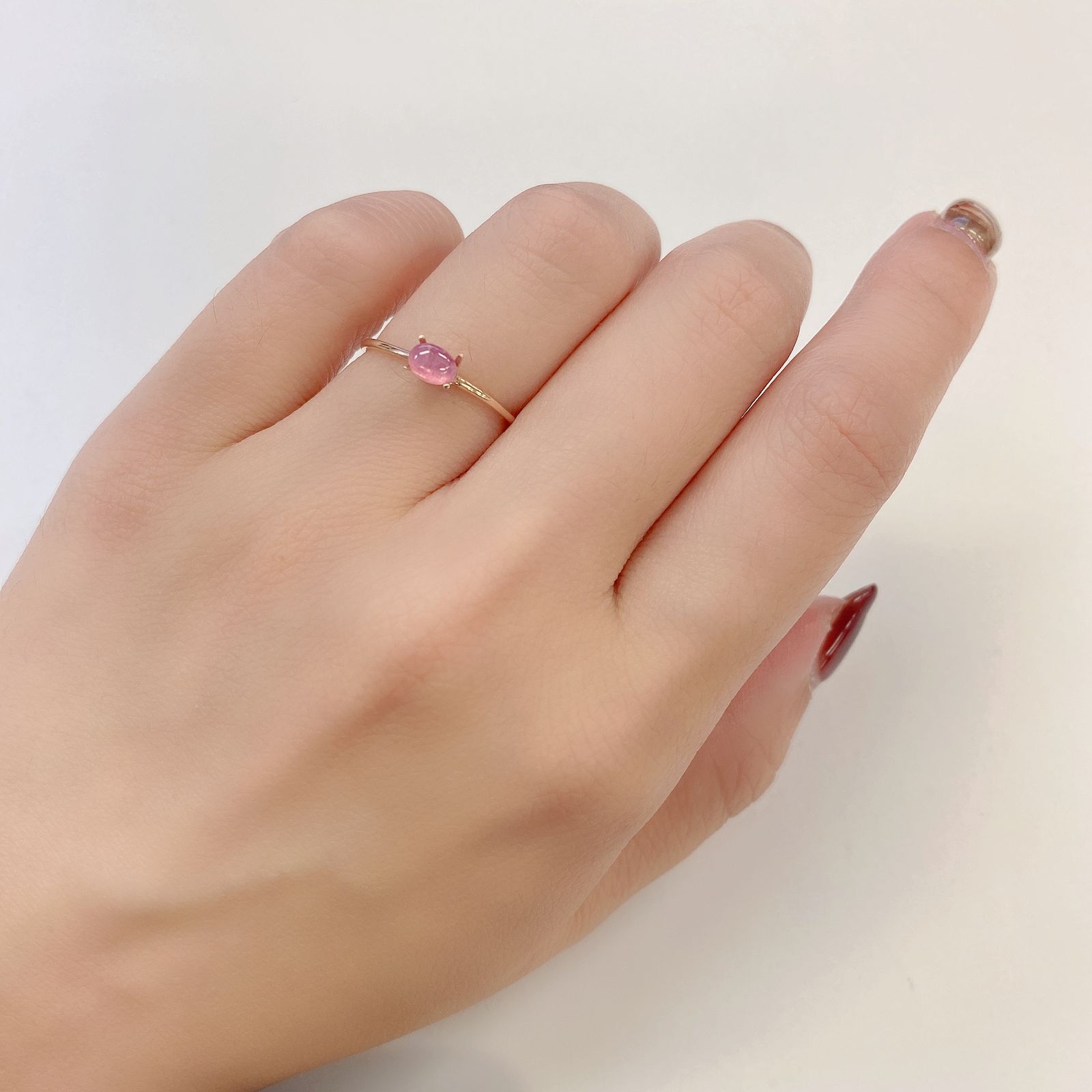 ペツォッタイトキャッツアイ(ラズベリル)(宝石名ペツォッタイト・キャッツアイ) マダガスカル産 0.369ct ソ付(彩珠)[210711980]4.7×3.5mm前後