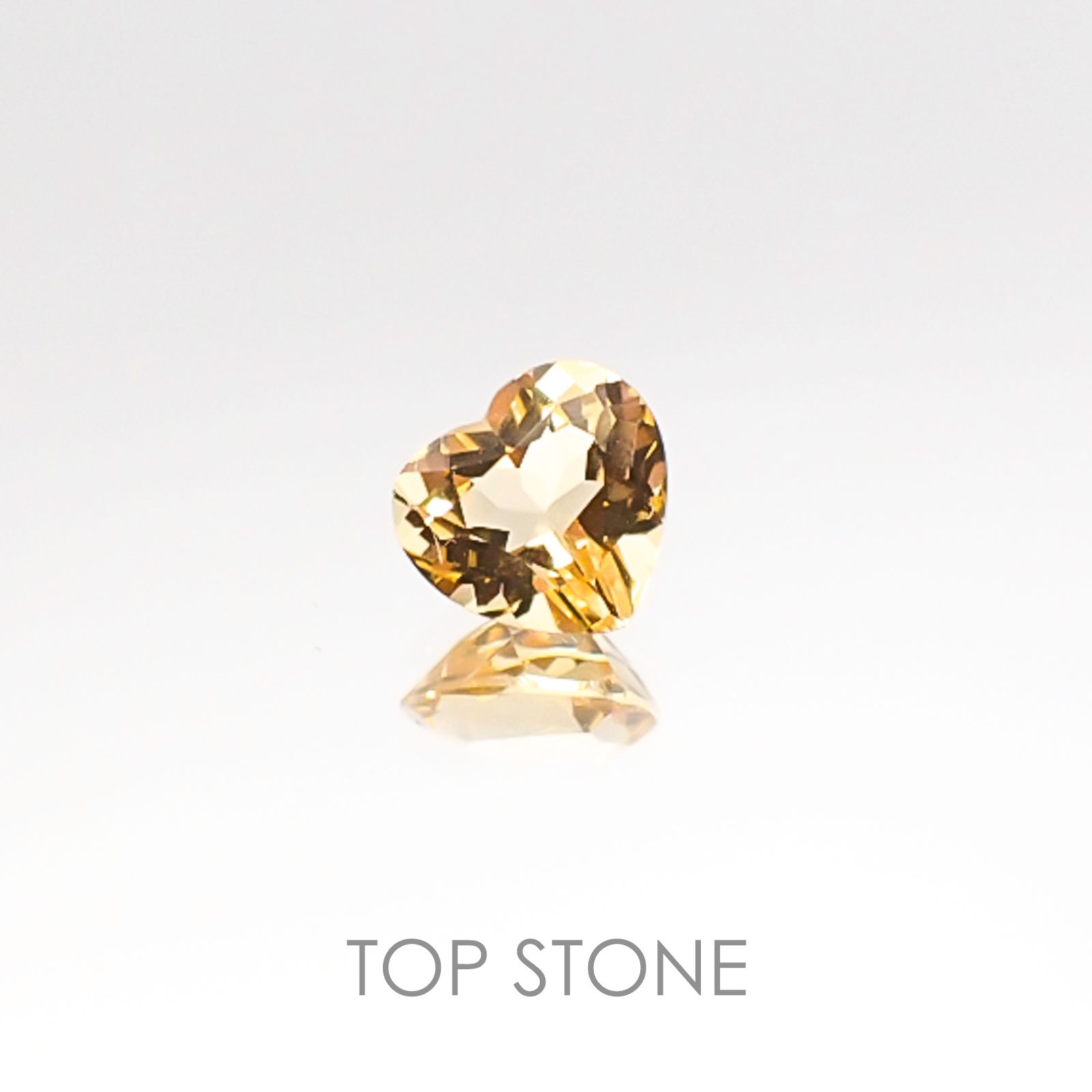 インペリアルトパーズ ブラジル産 ルース 0.5ct[20106514]5.2×4.9mm前後