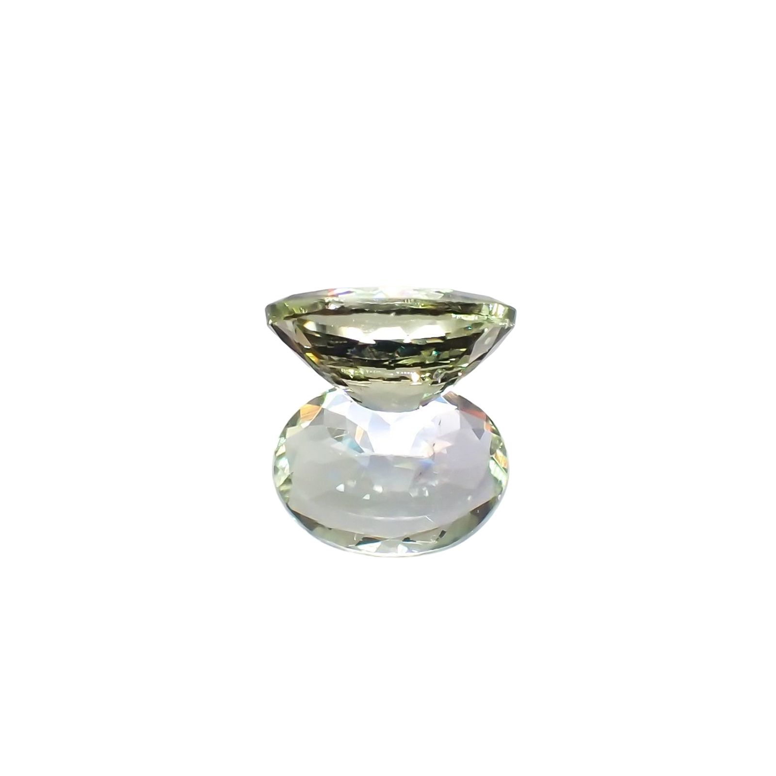 バイカラータンザナイト(宝石名バイカラー・ゾイサイト) タンザニア産 識別済 1.56ct / 8.6x6.5mm前後 [210812651]