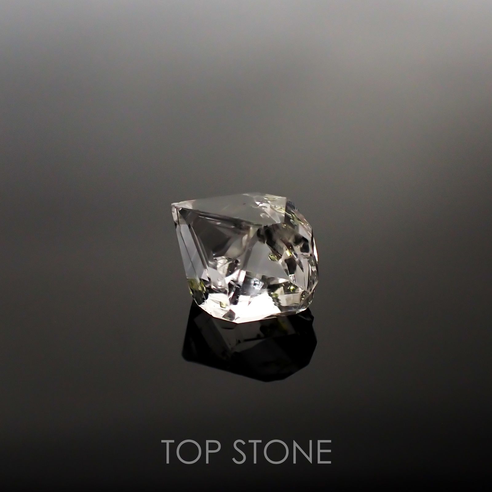 オイルインクォーツ パキスタン産 ルース 4.14ct[210911444]11.6×9.4mm前後