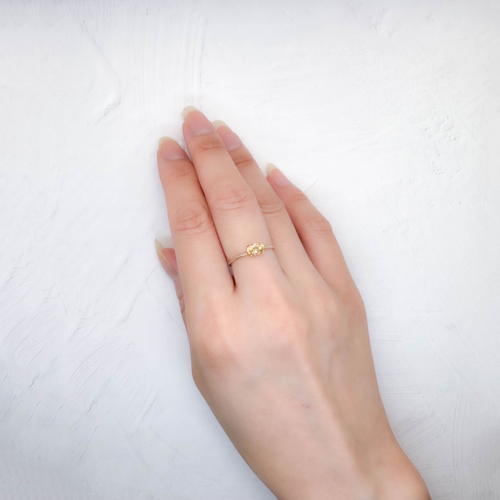 インペリアルトパーズ(宝石名トパーズ)ブラジル産 0.59ct / 6.1x4.1mm前後 [250630494]