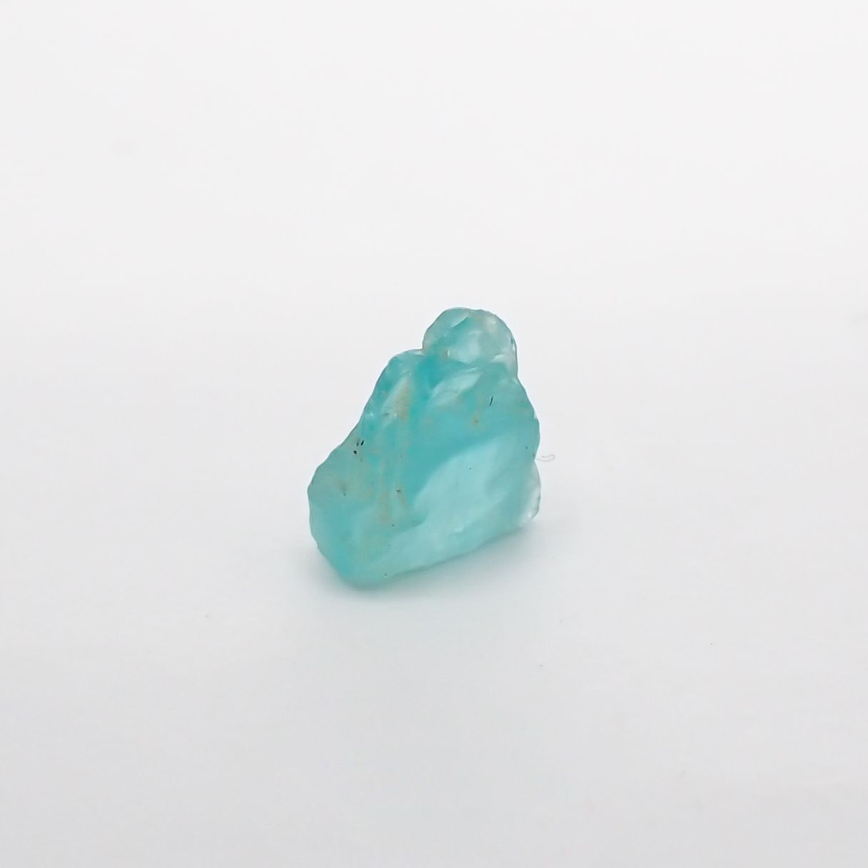 パライバトルマリン(宝石名トルマリン/別名パライバ・トルマリン) ブラジル・バターリャ鉱山産 原石 0.29ct 識別済[210911479]3.6×4.3mm前後