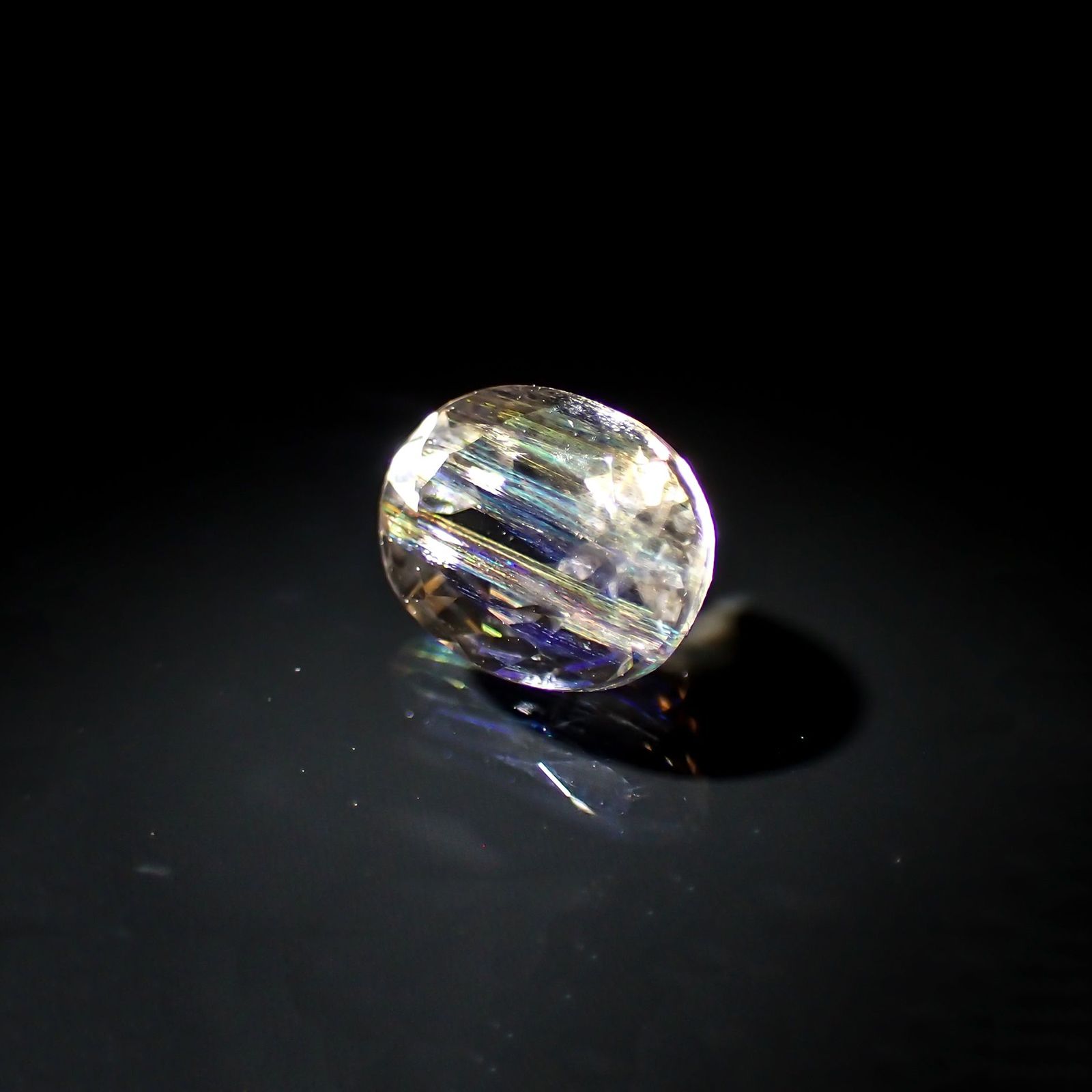 レインボースキャポライト(宝石名イリデッセント・スキャポライト) ブラジル産 識別済 1.42ct / 8.1×6mm前後 [210310340]